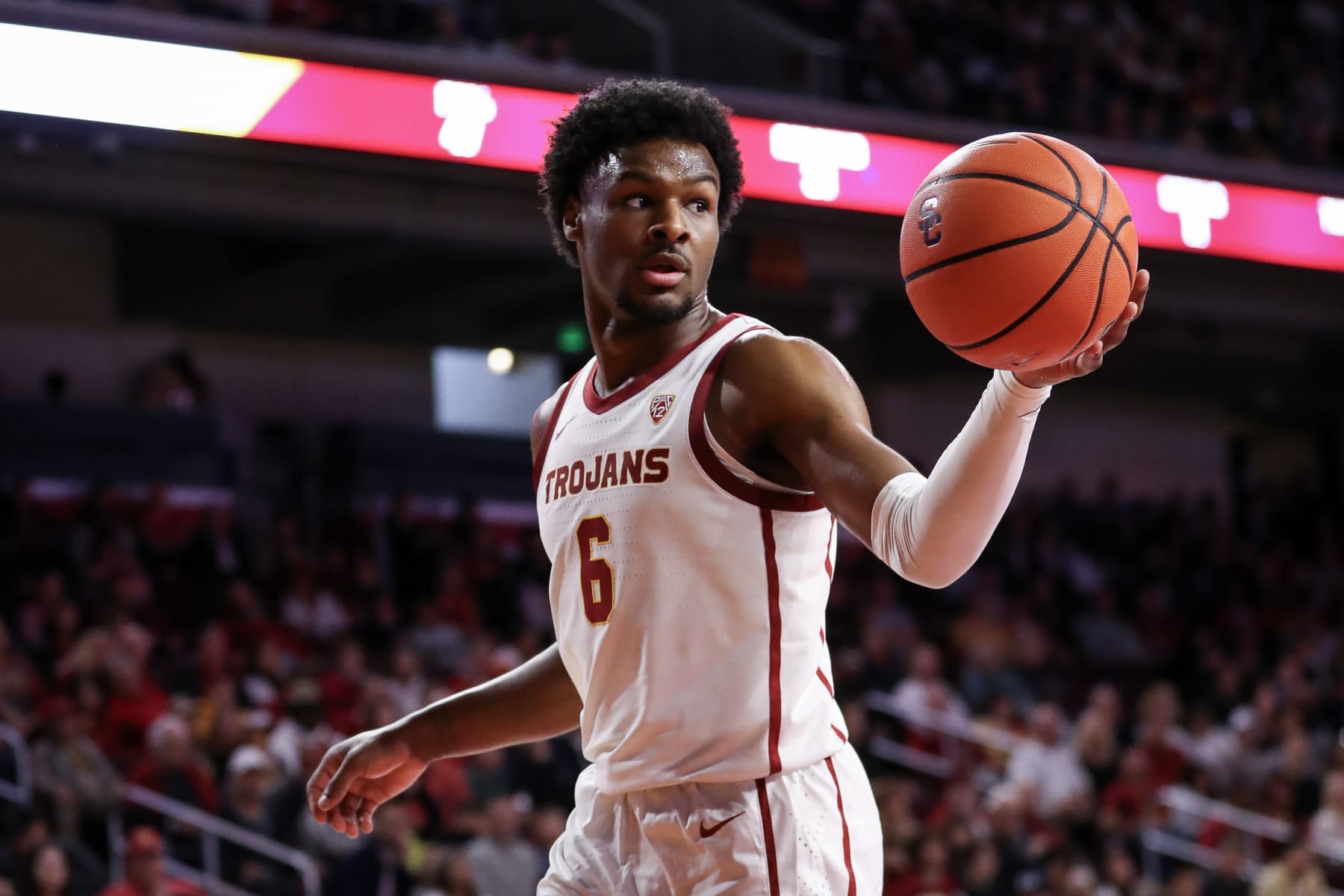 LOS ANGELES, CALIFORNIA - JANUARY 06: Bronny James #6 of the USC Trojans looks to pass the ball in the second half against the Stanford Cardinal at Galen Center on January 06, 2024 in Los Angeles, California. (Photo by Meg Oliphant/Getty Images)
