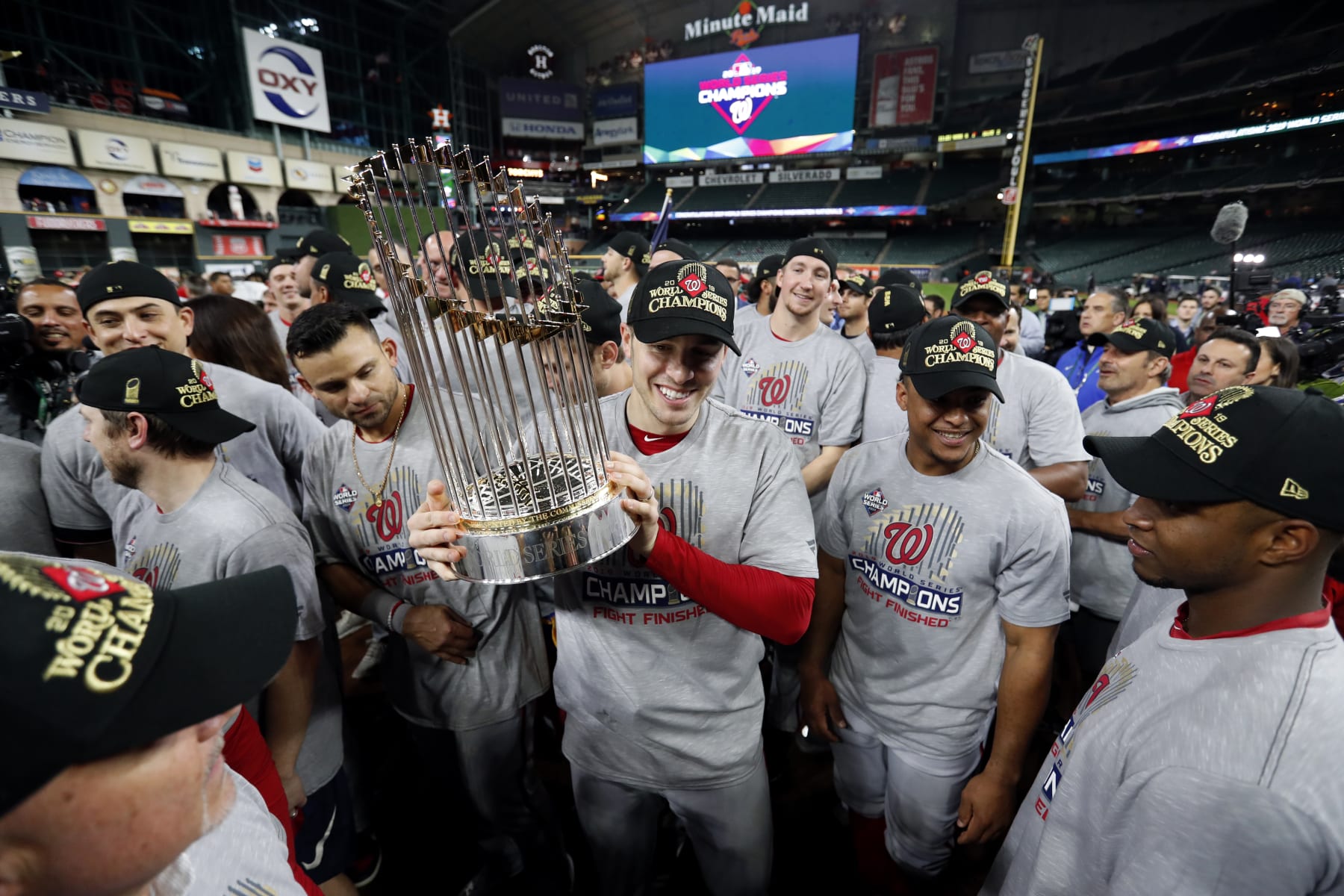 HOUSTON, TX - OCTOBER 30: Patrick Corbin #46 of the Washington Nationals celebrates with the Commissioner's Trophy after the Nationals defeated the Houston Astros in Game 7 to win the 2019 World Series at Minute Maid Park on Wednesday, October 30, 2019 in Houston, Texas. (Photo by Rob Tringali/MLB Photos via Getty Images)