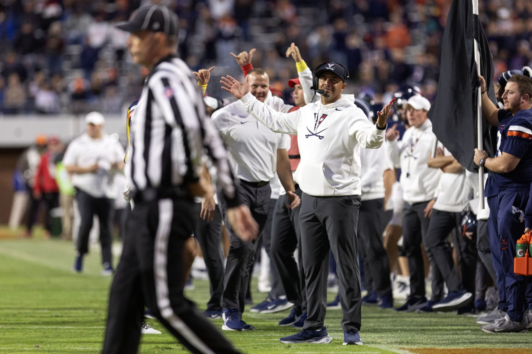 CHARLOTTESVILLE, VIRGINIA - NOVEMBER 18: Head coach Tony Elliott of the Virginia Cavaliers gestures toward referee John Hoffman in the second half during a game against the Duke Blue Devils at Scott Stadium on November 18, 2023 in Charlottesville, Virginia. (Photo by Ryan M. Kelly/Getty Images)