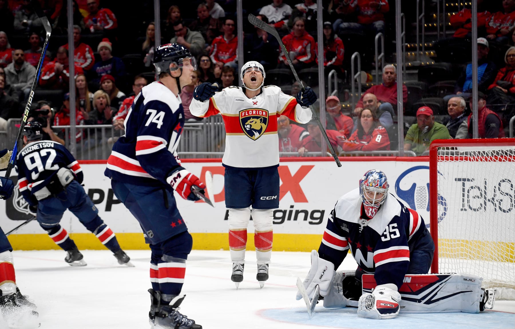 WASHINGTON, DC - NOVEMBER 08: Panthers center Sam Reinhart (13) celebrates after his game-winning goal in overtime past Capitals goalie Darcy Kuemper (35) during the Florida Panthers versus Washington Capitals National Hockey League game on November 8, 2023 at Capital One Arena in Washington, D.C.. (Photo by Randy Litzinger/Icon Sportswire via Getty Images)