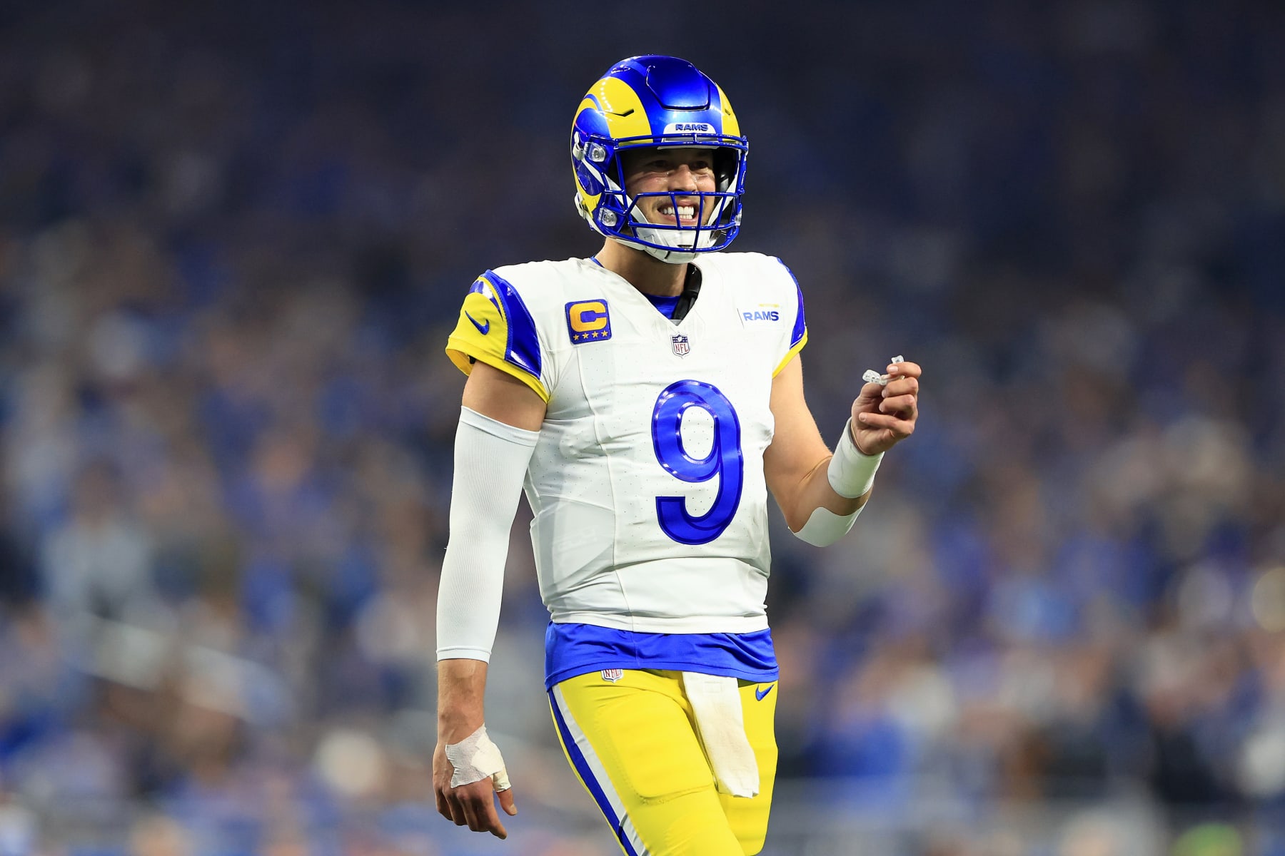 DETROIT, MICHIGAN - JANUARY 14: Matthew Stafford #9 of the Los Angeles Rams reacts during the first quarter against the Detroit Lions in the NFC Wild Card Playoffs at Ford Field on January 14, 2024 in Detroit, Michigan. (Photo by Rey Del Rio/Getty Images)
