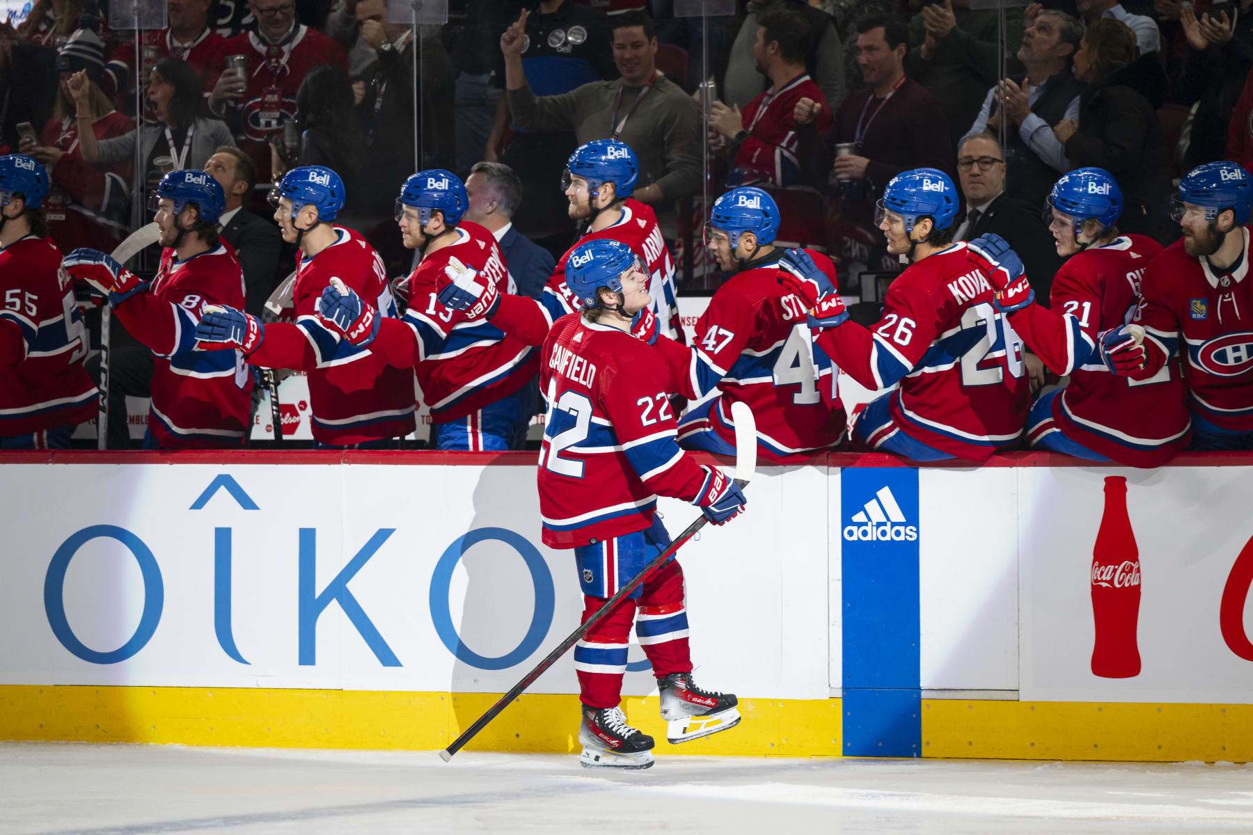 MONTREAL, CANADA - JANUARY 13: Cole Caufield #22 of the Montreal Canadiens celebrates a goal with the bench during the first period of the NHL regular season game between the Montreal Canadiens and the Edmonton Oilers at the Bell Centre on January 13, 2024 in Montreal, Quebec, Canada. (Photo by Matt Garies/NHLI via Getty Images)