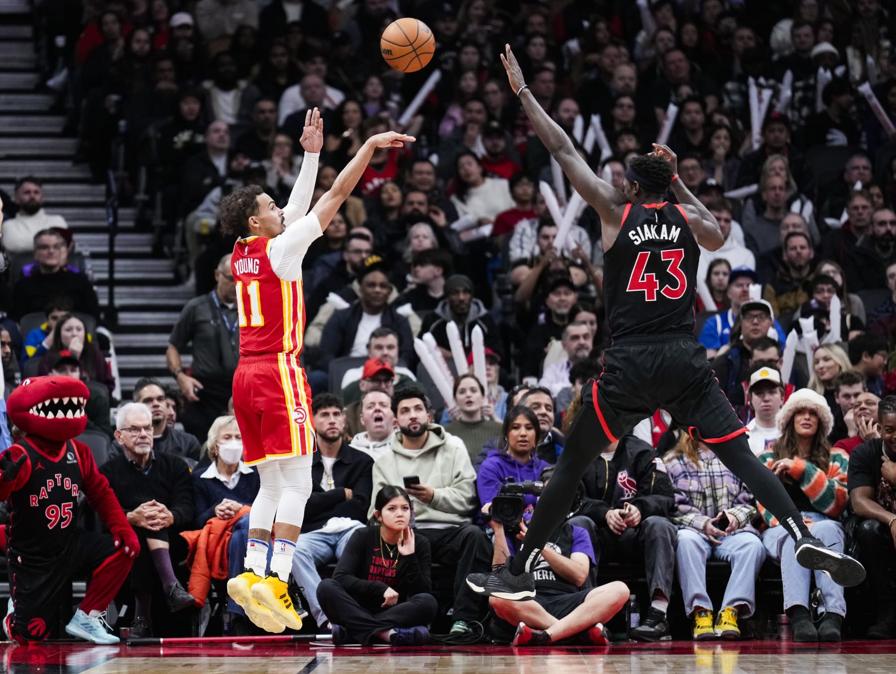 Trae Young and Pascal Siakam