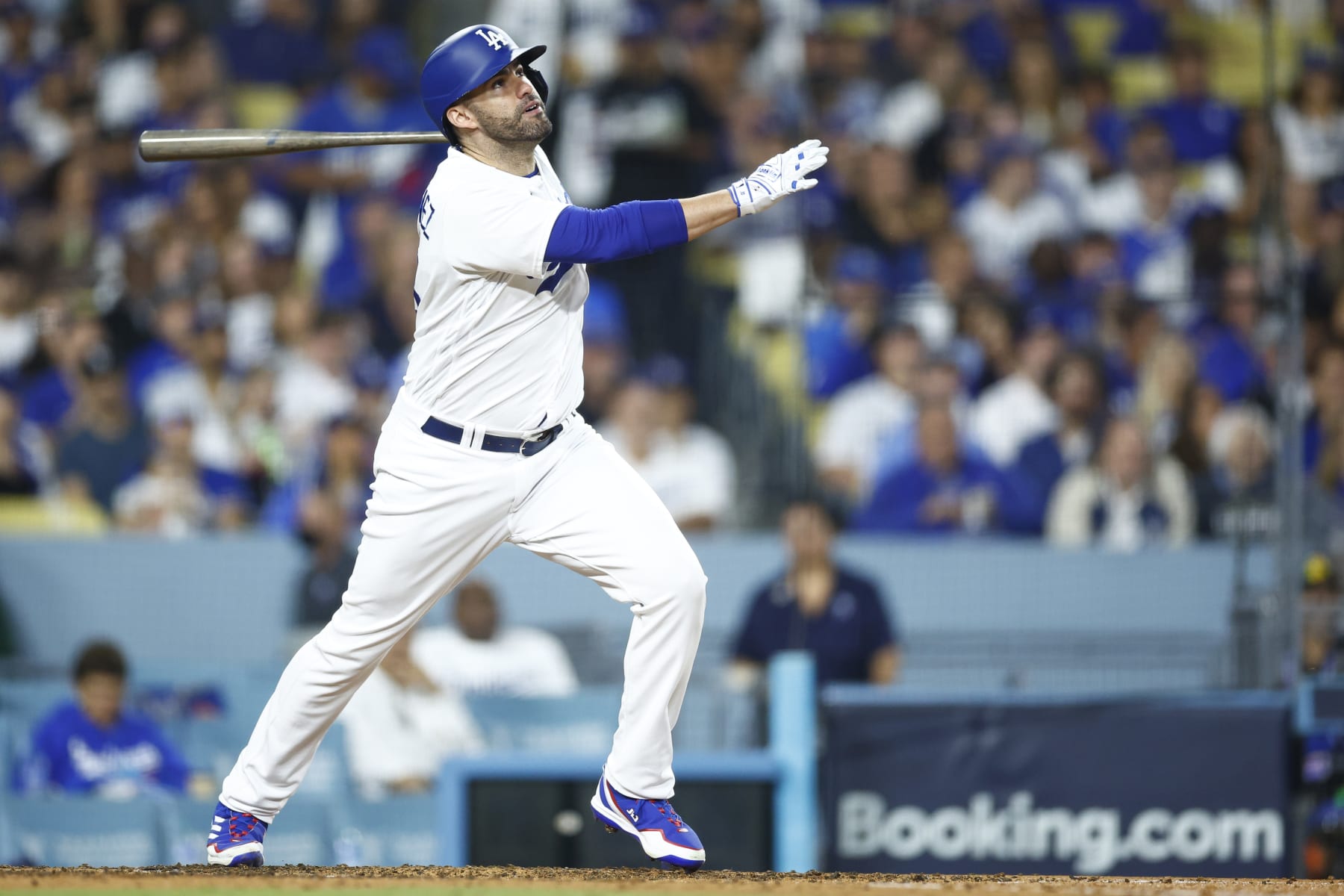 LOS ANGELES, CALIFORNIA - OCTOBER 09: J.D. Martinez #28 of the Los Angeles Dodgers hits a solo home run against the Arizona Diamondbacks during the fourth inning in Game Two of the Division Series at Dodger Stadium on October 09, 2023 in Los Angeles, California. (Photo by Ronald Martinez/Getty Images)