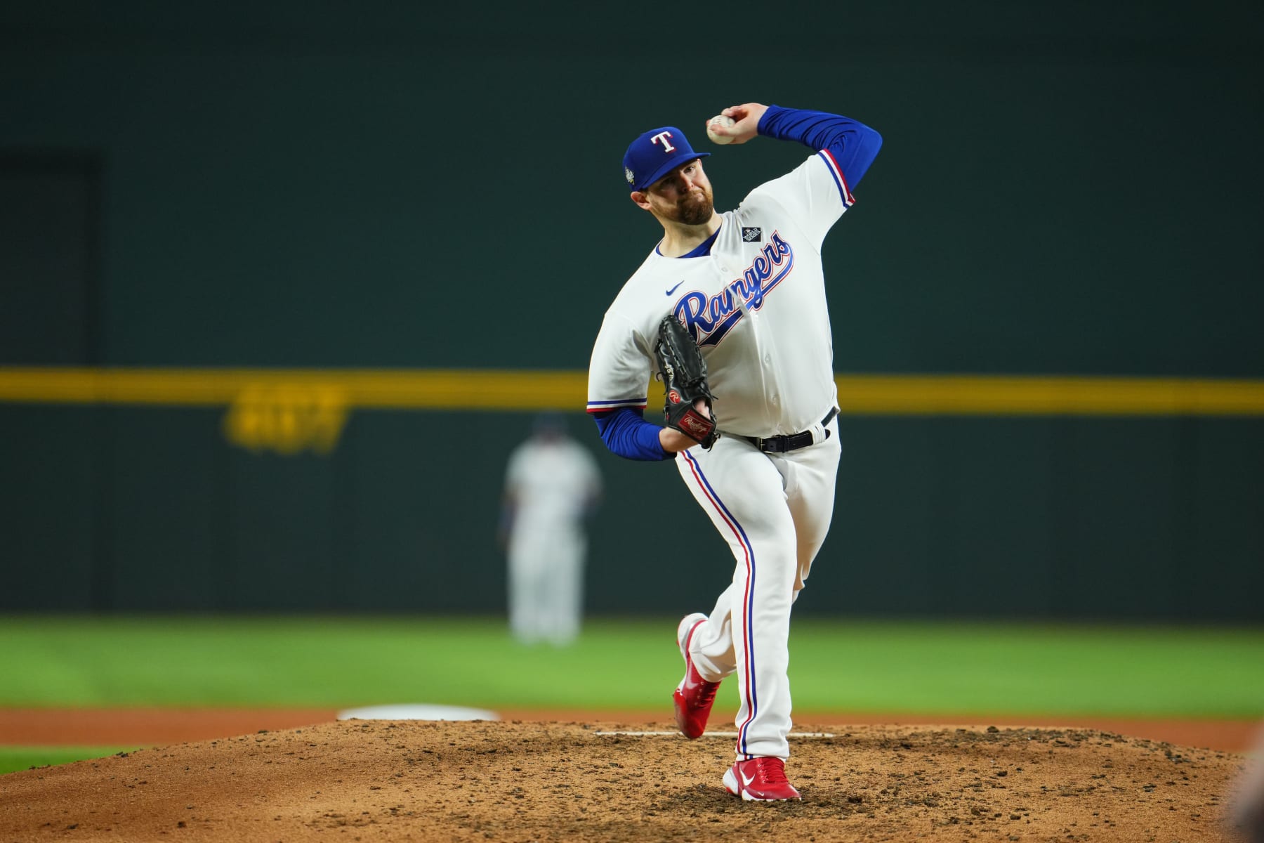 ARLINGTON, TX - OCTOBER 28: Jordan Montgomery #52 of the Texas Rangers pitches during Game 2 of the 2023 World Series between the Arizona Diamondbacks and the Texas Rangers at Globe Life Field on Saturday, October 28, 2023 in Arlington, Texas. (Photo by Cooper Neill/MLB Photos via Getty Images)