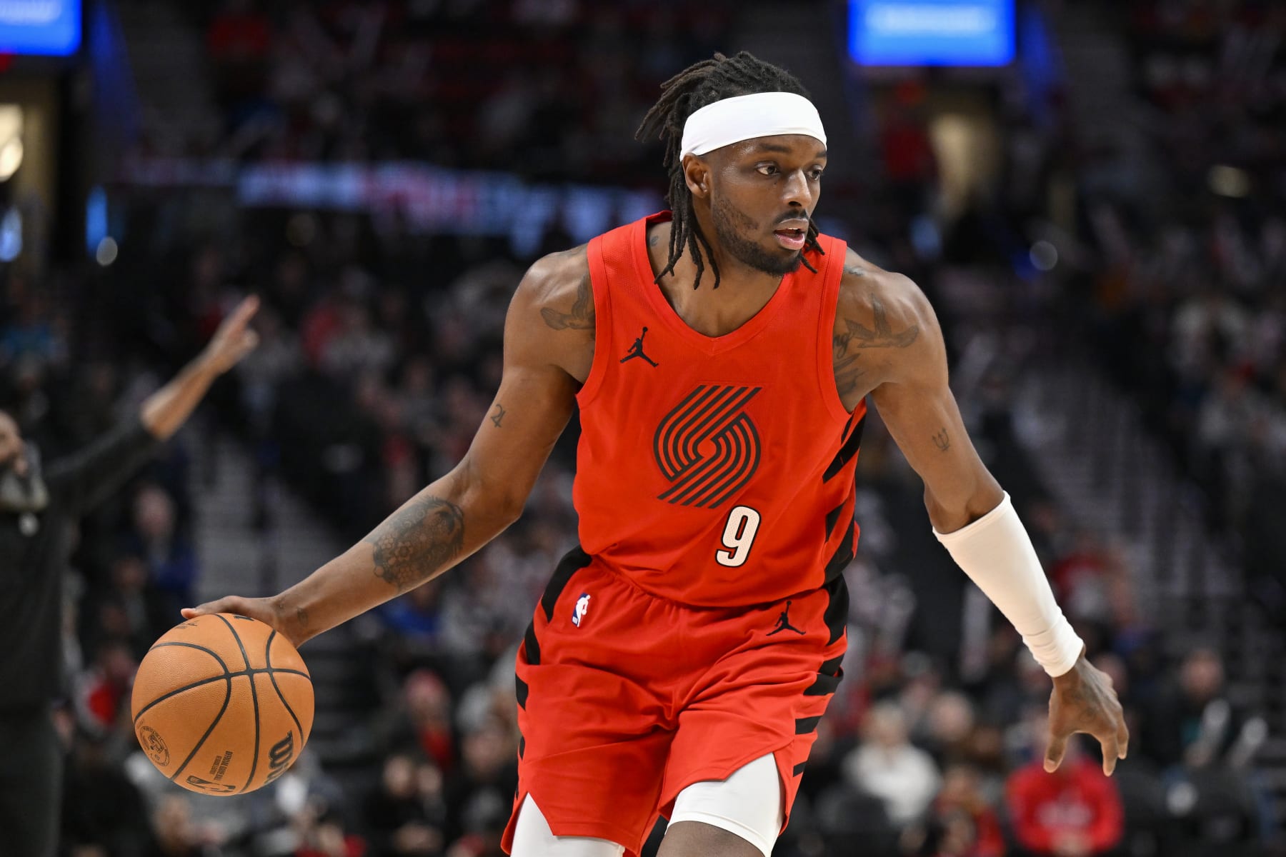 PORTLAND, OREGON - JANUARY 17: Jerami Grant #9 of the Portland Trail Blazers dribbles during the fourth quarter against the Brooklyn Nets at the Moda Center on January 17, 2024 in Portland, Oregon. The Portland Trail Blazers won 105-103. NOTE TO USER: User expressly acknowledges and agrees that, by downloading and or using this photograph, User is consenting to the terms and conditions of the Getty Images License Agreement. (Photo by Alika Jenner/Getty Images)