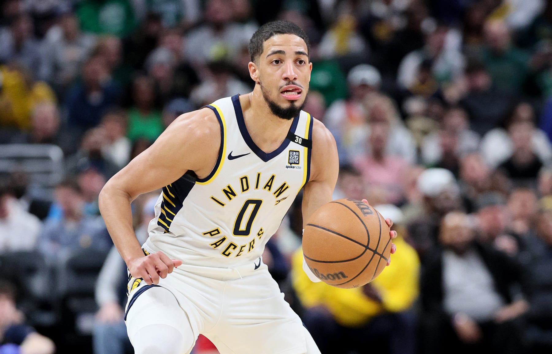 INDIANAPOLIS, INDIANA - JANUARY 08:   Tyrese Haliburton #0 of the Indiana Pacers dribbles the ball in the first half against the Boston Celtics at Gainbridge Fieldhouse on January 08, 2024 in Indianapolis, Indiana.    NOTE TO USER: User expressly acknowledges and agrees that, by downloading and or using this photograph, User is consenting to the terms and conditions of the Getty Images License Agreement.  (Photo by Andy Lyons/Getty Images)