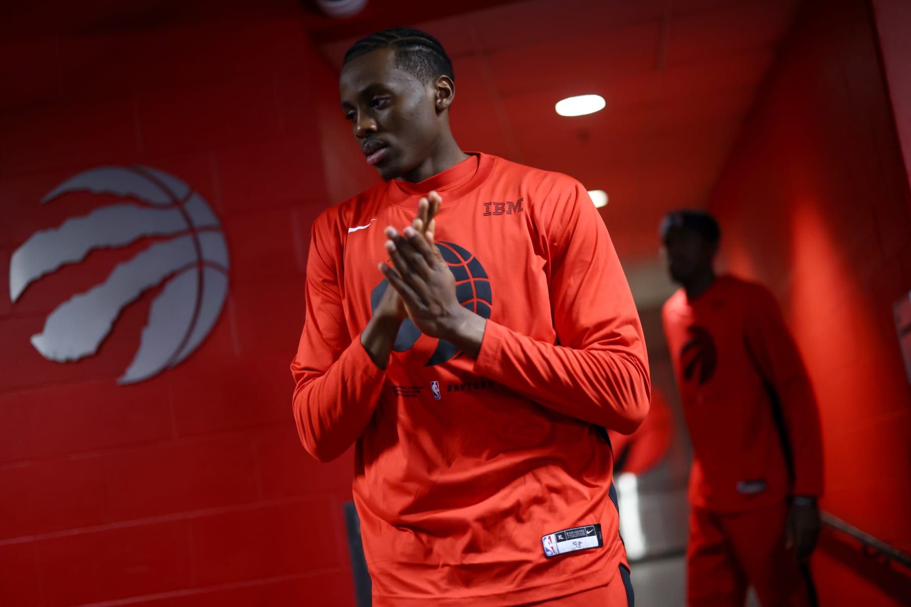 TORONTO, CANADA - APRIL 12: Christian Koloko #35 of the Toronto Raptors walks to the court before the game against the Chicago Bulls during the 2023 Play-In Tournament on April 12, 2023 at the Scotiabank Arena in Toronto, Ontario, Canada. NOTE TO USER: User expressly acknowledges and agrees that, by downloading and or using this Photograph, user is consenting to the terms and conditions of the Getty Images License Agreement. Mandatory Copyright Notice: Copyright 2023 NBAE (Photo by Vaughn Ridley/NBAE via Getty Images)
