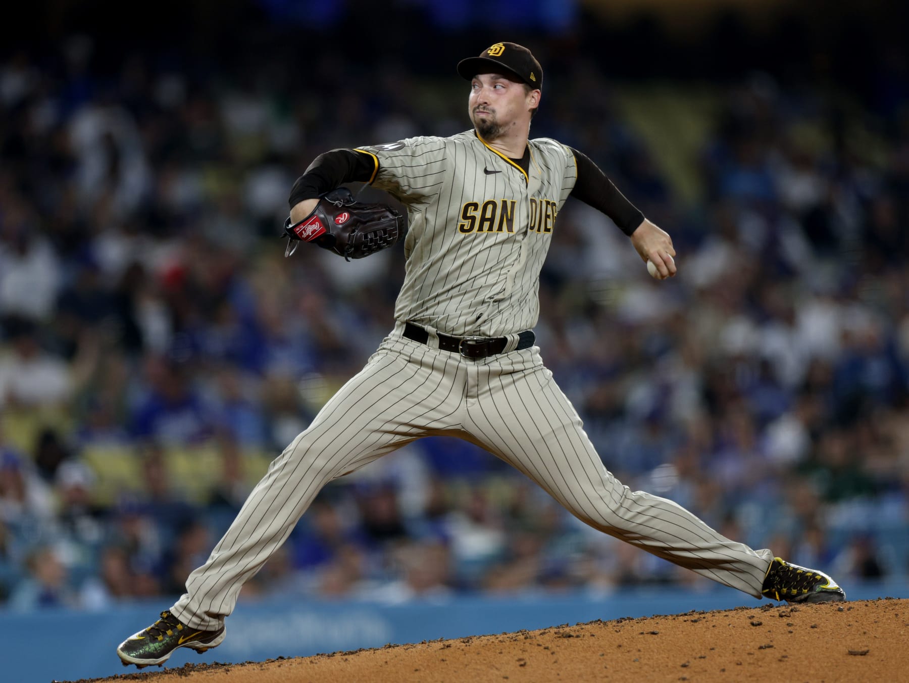 LOS ANGELES, CALIFORNIA - SEPTEMBER 13: Blake Snell #4 of the San Diego Padres pitches during he sixth inning against the Los Angeles Dodgers at Dodger Stadium on September 13, 2023 in Los Angeles, California. (Photo by Harry How/Getty Images)
