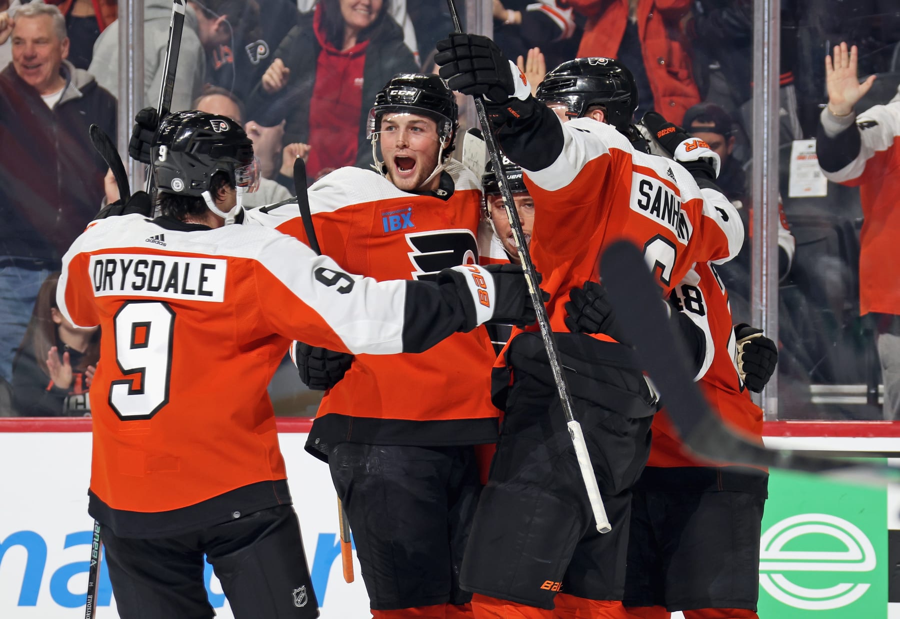 PHILADELPHIA, PENNSYLVANIA - JANUARY 18: Cam Atkinson #89 of the Philadelphia Flyers(center) is surrounded by teammates Jamie Drysdale #9, Tyson Foerster #71, Travis Sanheim #6, and Morgan Frost #48 after scoring a third period power-play goal against the Dallas Stars at the Wells Fargo Center on January 18, 2024 in Philadelphia, Pennsylvania. (Photo by Len Redkoles/NHLI via Getty Images)