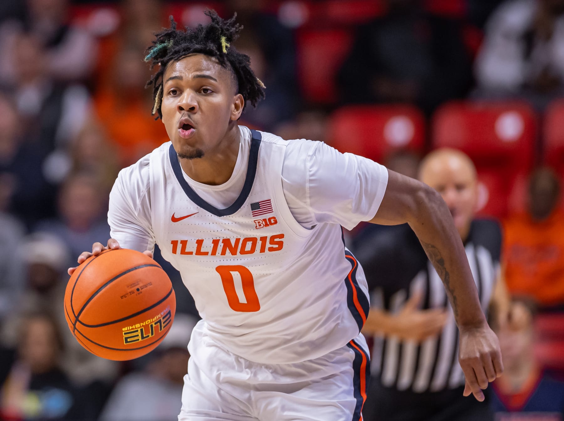 CHAMPAIGN, ILLINOIS - DECEMBER 17: Terrence Shannon Jr. #0 of the Illinois Fighting Illini brings the ball up court during the game against the Colgate Raiders at State Farm Center on December 17, 2023 in Champaign, Illinois. (Photo by Michael Hickey/Getty Images)