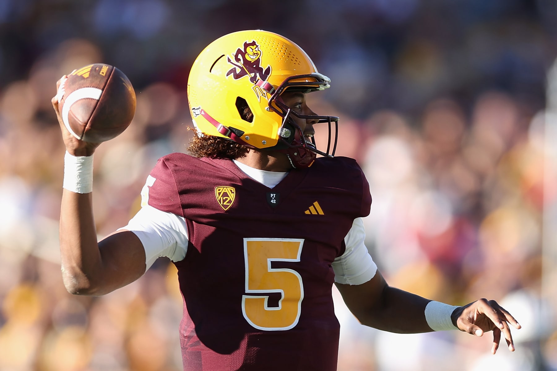 TEMPE, ARIZONA - NOVEMBER 25: Quarterback Jaden Rashada #5 of the Arizona State Sun Devils throws a pass during the first half of the NCAAF game against the Arizona Wildcats at Mountain America Stadium on November 25, 2023 in Tempe, Arizona. (Photo by Christian Petersen/Getty Images)