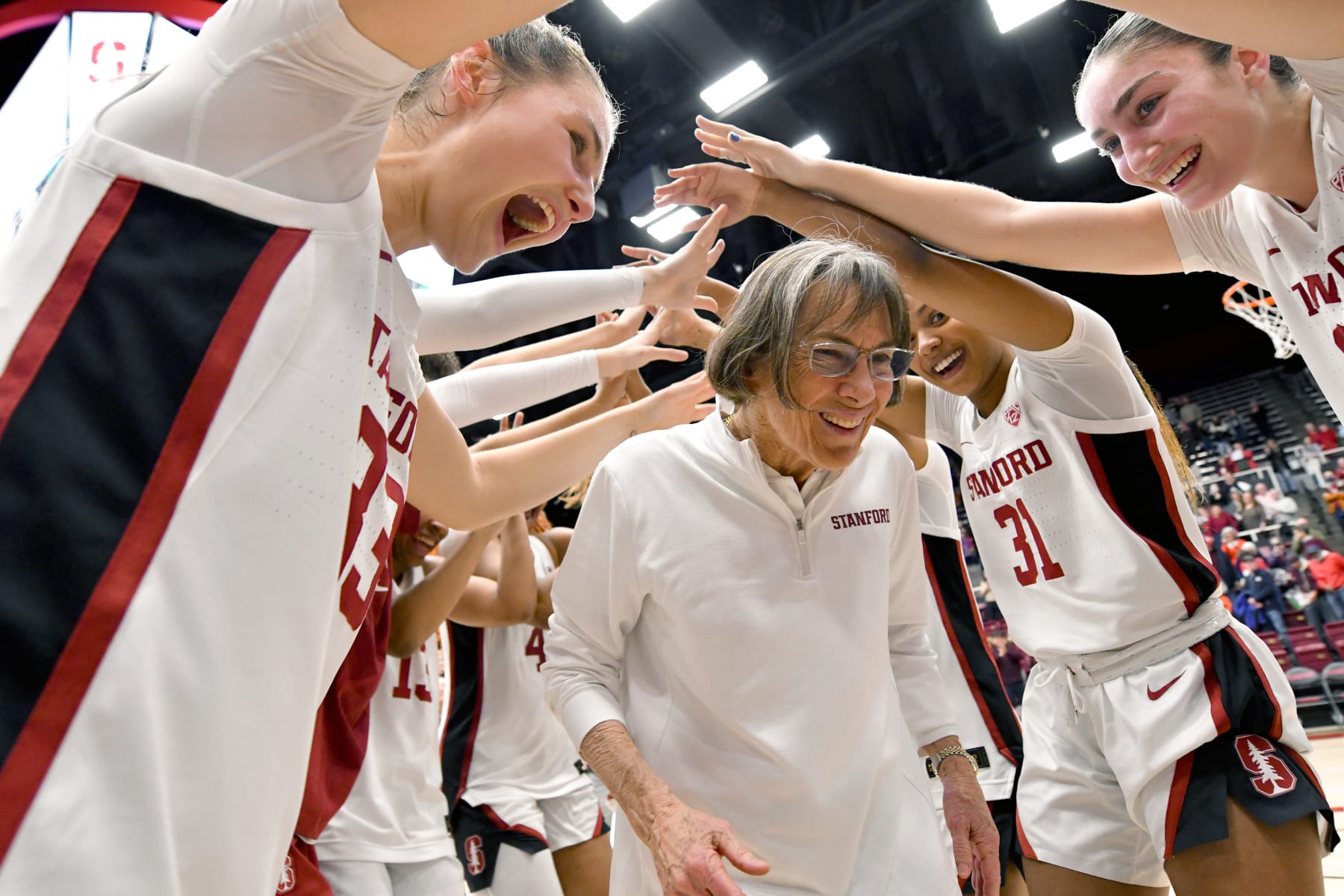 PALO ALTO, CALIFORNIA - JANUARY 19: Stanford Cardinal head coach Tara VanDerveer celebrates at Stanford Maples Pavilion after a game against the Oregon Ducks. Tara VanDerveer ties Mike Krzyzewski with 1,202 NCAA career wins at Stanford Maples Pavilion on January 19, 2024 in Palo Alto, California. (Photo by Brandon Vallance/Getty Images)