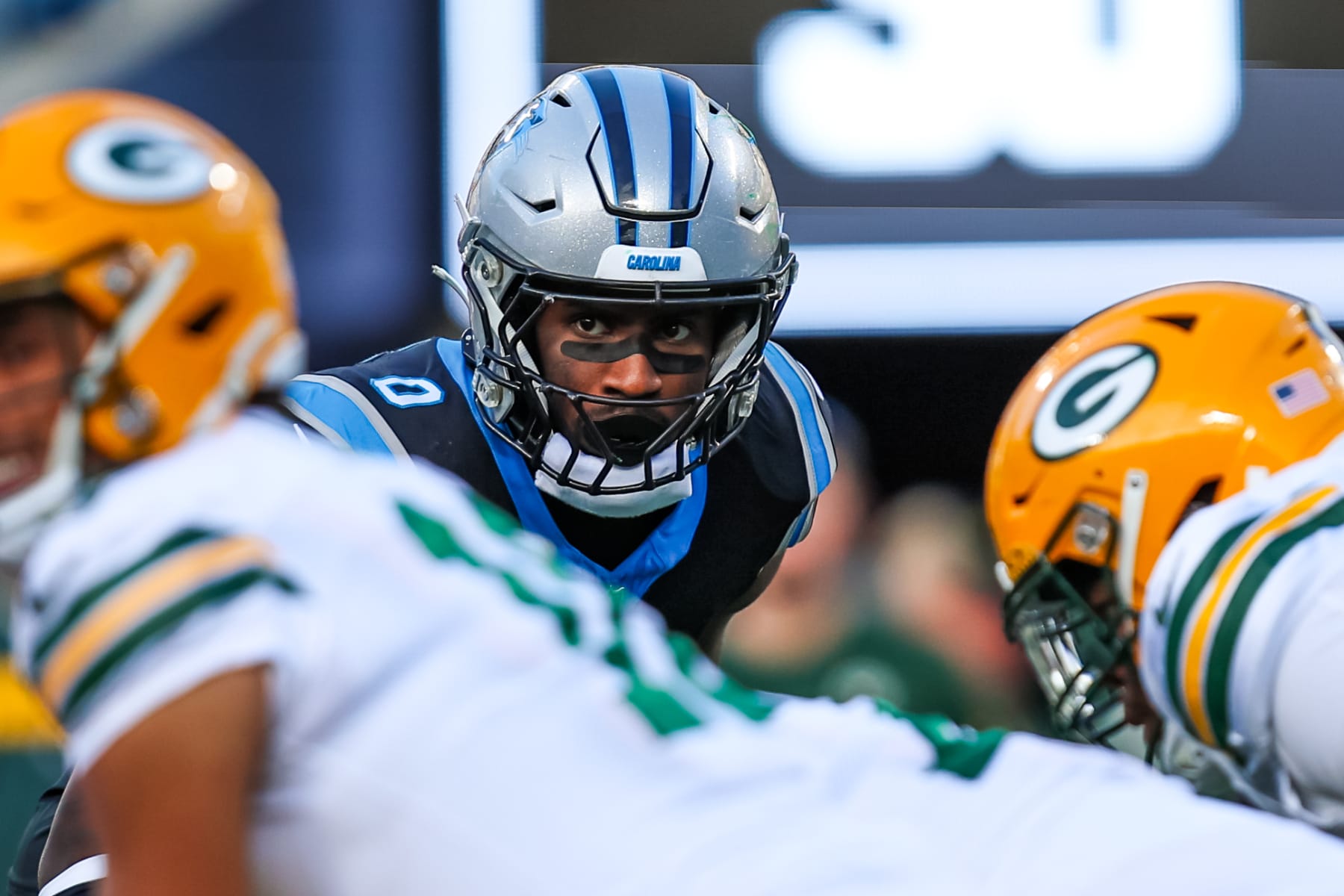 CHARLOTTE, NC - DECEMBER 24: Brian Burns #0 of the Carolina Panthers reads the offense during an NFL game against the Green Bay Packers at Bank of America Stadium on December 24, 2023 in Charlotte, NC. (Photo by David Jensen/Icon Sportswire via Getty Images)