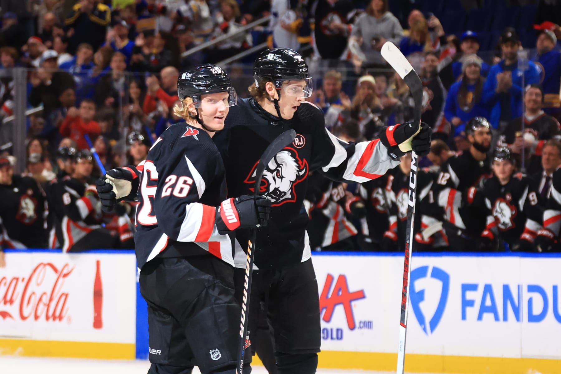BUFFALO, NEW YORK - JANUARY 11: Tage Thompson #72 of the Buffalo Sabres celebrates his second first period goal against the Ottawa Senators with Rasmus Dahlin #26 during an NHL game on January 11, 2024 at KeyBank Center in Buffalo, New York. (Photo by Bill Wippert/NHLI via Getty Images)