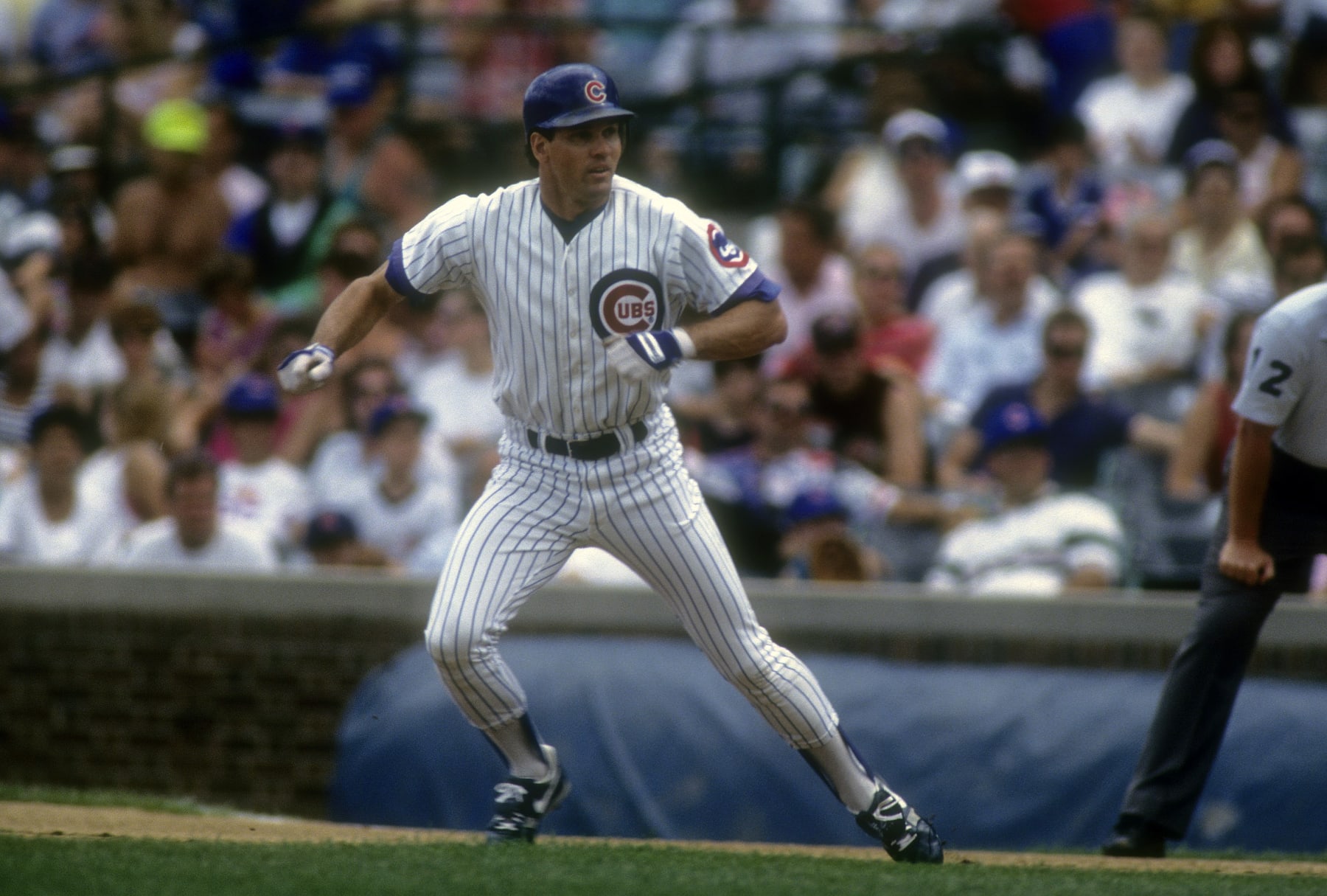 CHICAGO, IL - CIRCA 1992: Ryan Sandberg #23 of the Chicago Cubs leads off from first base during a MLB baseball game circa early 1992 at Wrigley Field in Chicago, Illinois. Sandberg played for the Cubs from 1981-97. (Photo by Focus on Sport/Getty Images) 