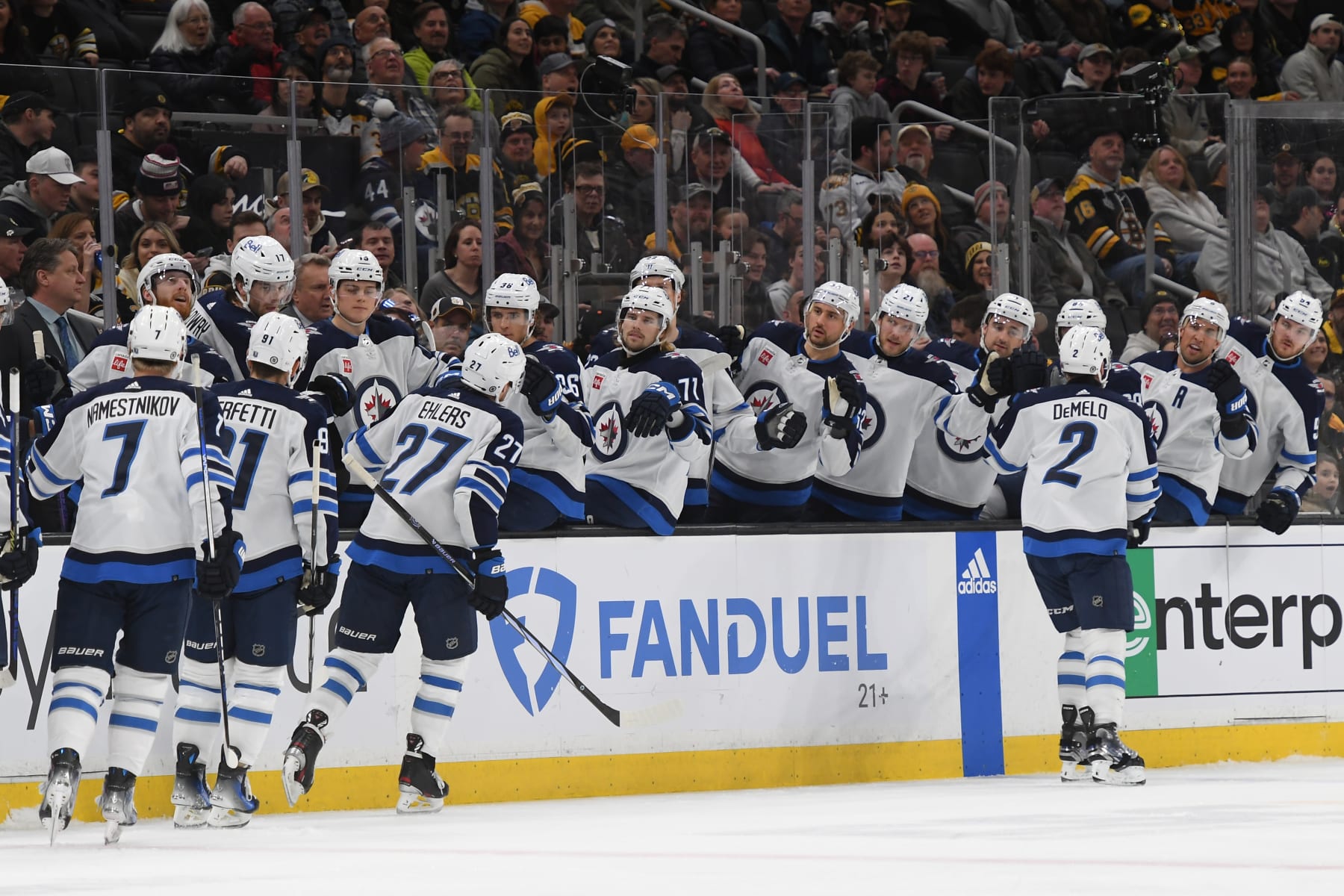 BOSTON, MASSACHUSETTS - JANUARY 22: Dylan DeMelo #2, Nikolaj Ehlers #27, Cole Perfetti #91 and Vladislav Namestnikov #7 of the Winnipeg Jets celebrate the first-period goal against the Boston Bruins at the TD Garden on January 22, 2024 in Boston, Massachusetts. (Photo by Steve Babineau/NHLI via Getty Images)