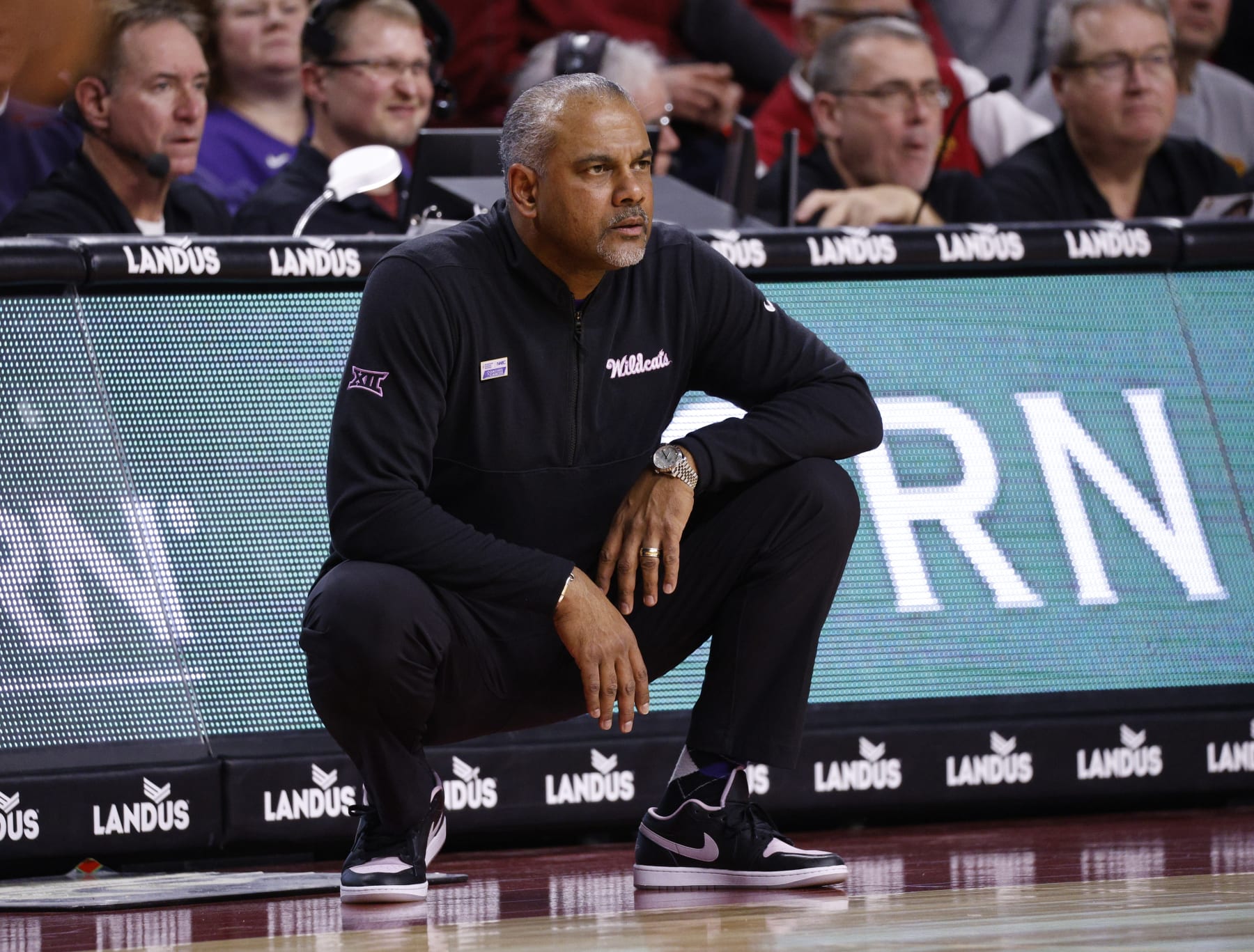 AMES, IA - JANUARY 24: Head coach Jerome Tang of the Kansas State Wildcats coaches from the bench in the first half of play at Hilton Coliseum on January 24, 2024 in Ames, Iowa. The Iowa State Cyclones won 78-67 over the Kansas State Wildcats. (Photo by David K Purdy/Getty Images)