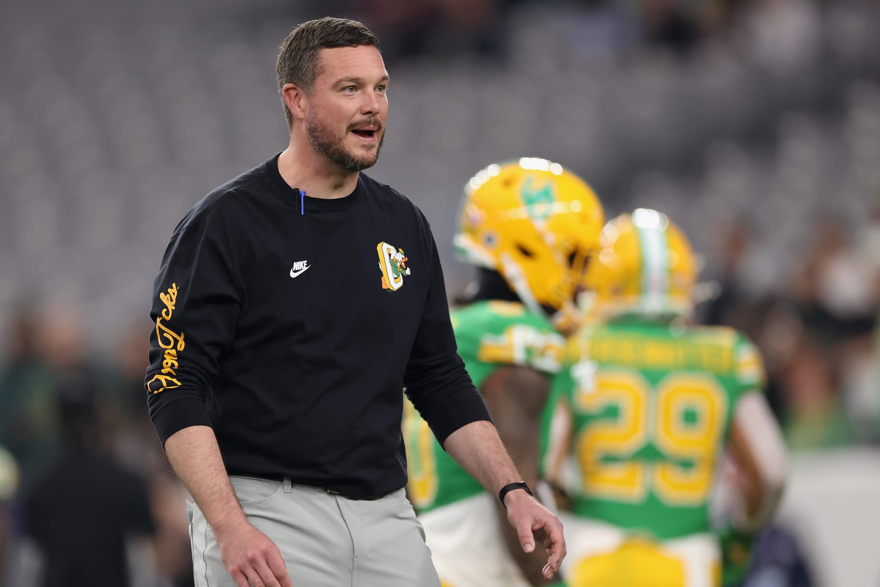 GLENDALE, ARIZONA - JANUARY 01: Head coach Dan Lanning of the Oregon Ducks watches warm ups to the Fiesta Bowl against the Liberty Flames at State Farm Stadium on January 01, 2024 in Glendale, Arizona. (Photo by Christian Petersen/Getty Images)