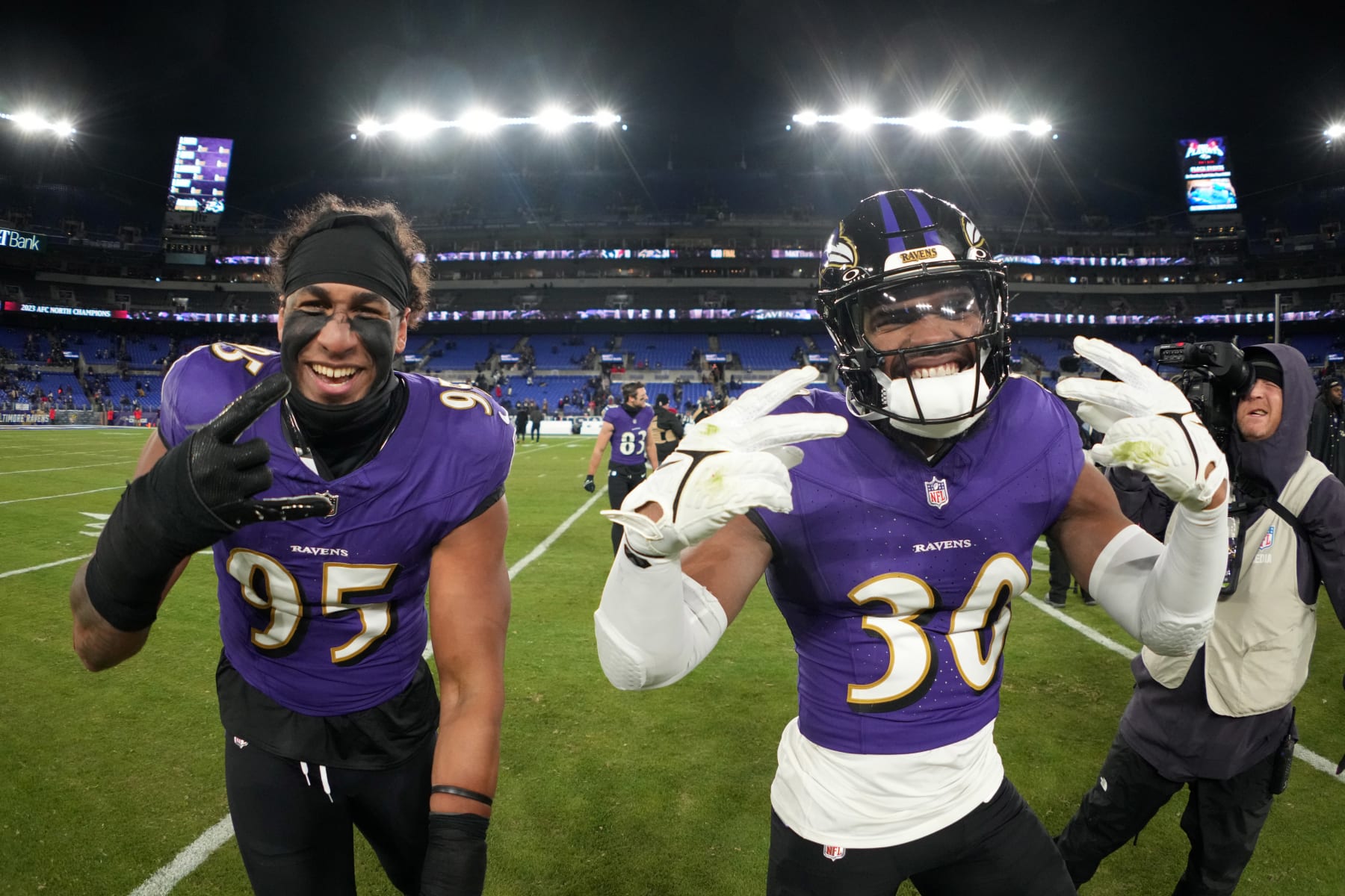 BALTIMORE, MARYLAND, JAN 20: Baltimore Ravens quarterback Lamar Jackson (8) celebrates with tight end Isaiah Likely (80) after a touchdown against the Houston Texans in the AFC Divisional Playoff game at M&T Bank Stadium on January 20, 2024 in Baltimore, Maryland. The Ravens defeated the Texans 34-10. (Photo by Kirby Lee/Getty Images)