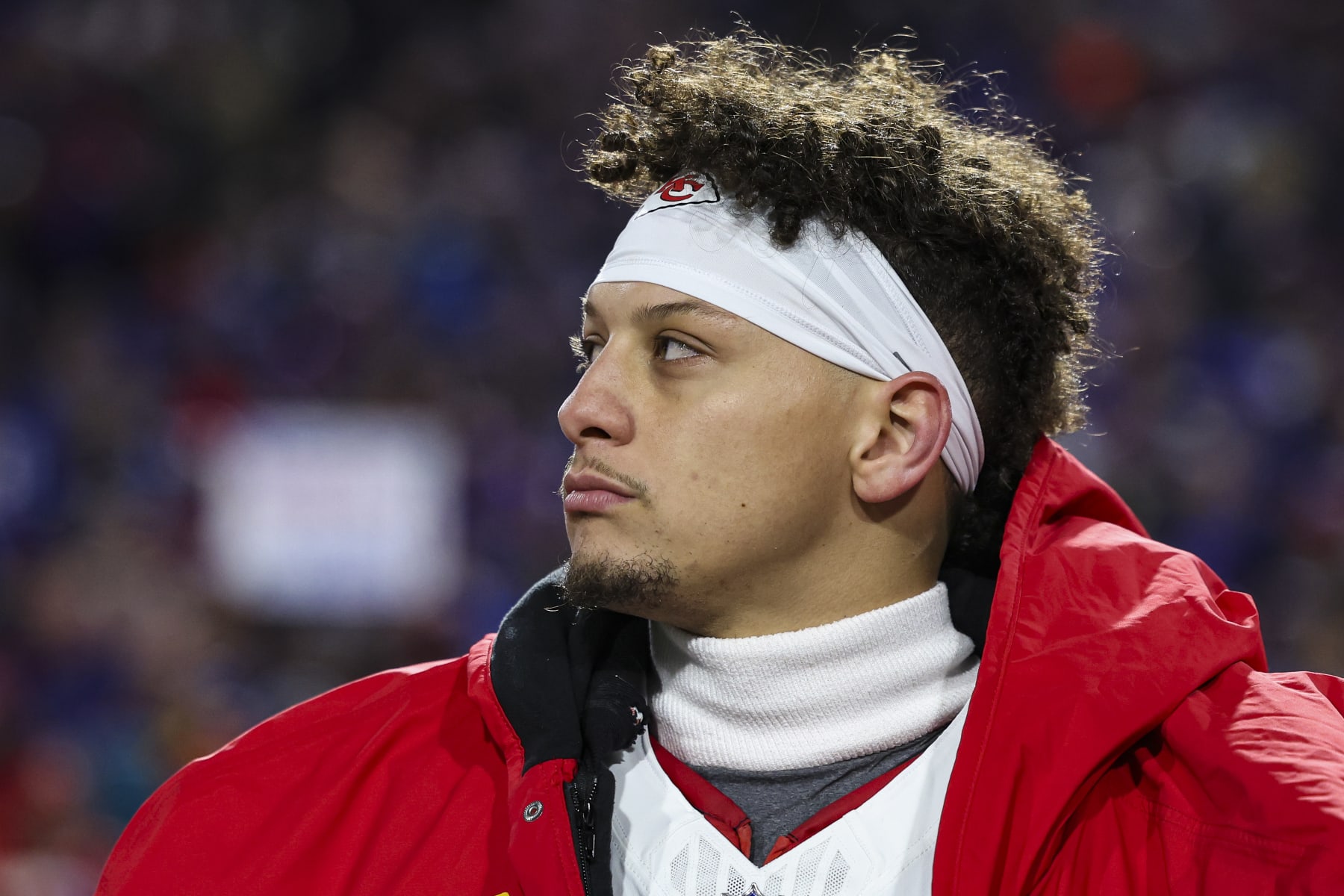 ORCHARD PARK, NY - JANUARY 21: Patrick Mahomes #15 of the Kansas City Chiefs looks on from the sideline during the national anthem prior to an NFL divisional round playoff football game against the Buffalo Bills at Highmark Stadium on January 21, 2024 in Orchard Park, New York. (Photo by Perry Knotts/Getty Images)