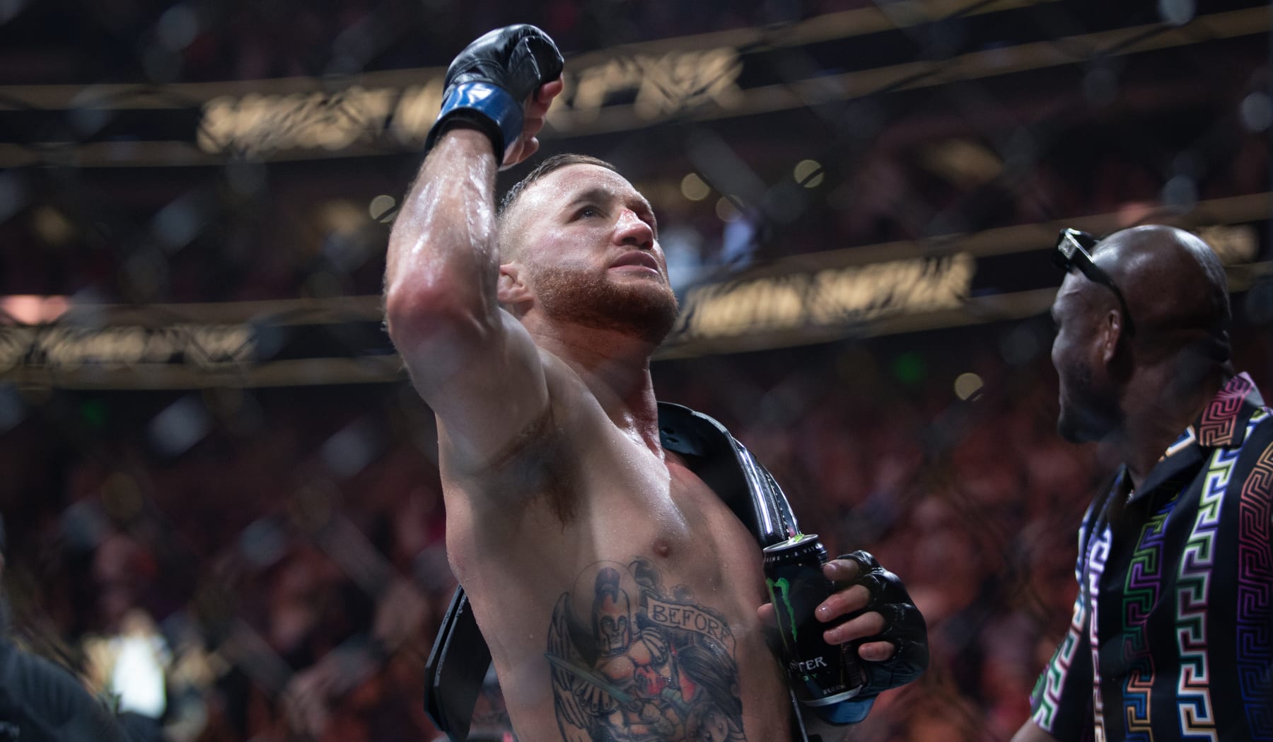 Justin Gaethje celebrates his "BMF" title win over Dustin Poirier.
