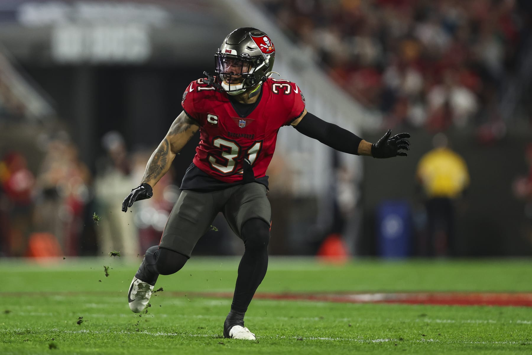 TAMPA, FL - JANUARY 15: Antoine Winfield Jr. #31 of the Tampa Bay Buccaneers defends in coverage during an NFL Wild Card playoff football game against the Philadelphia Eagles at Raymond James Stadium on January 15, 2024 in Tampa, Florida. (Photo by Perry Knotts/Getty Images)