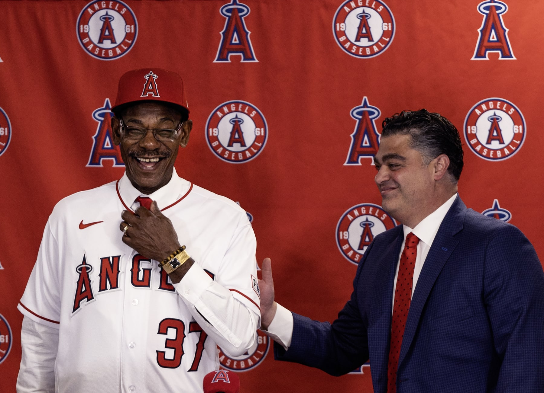 Ron Washington (L) and Perry Minasian (R)