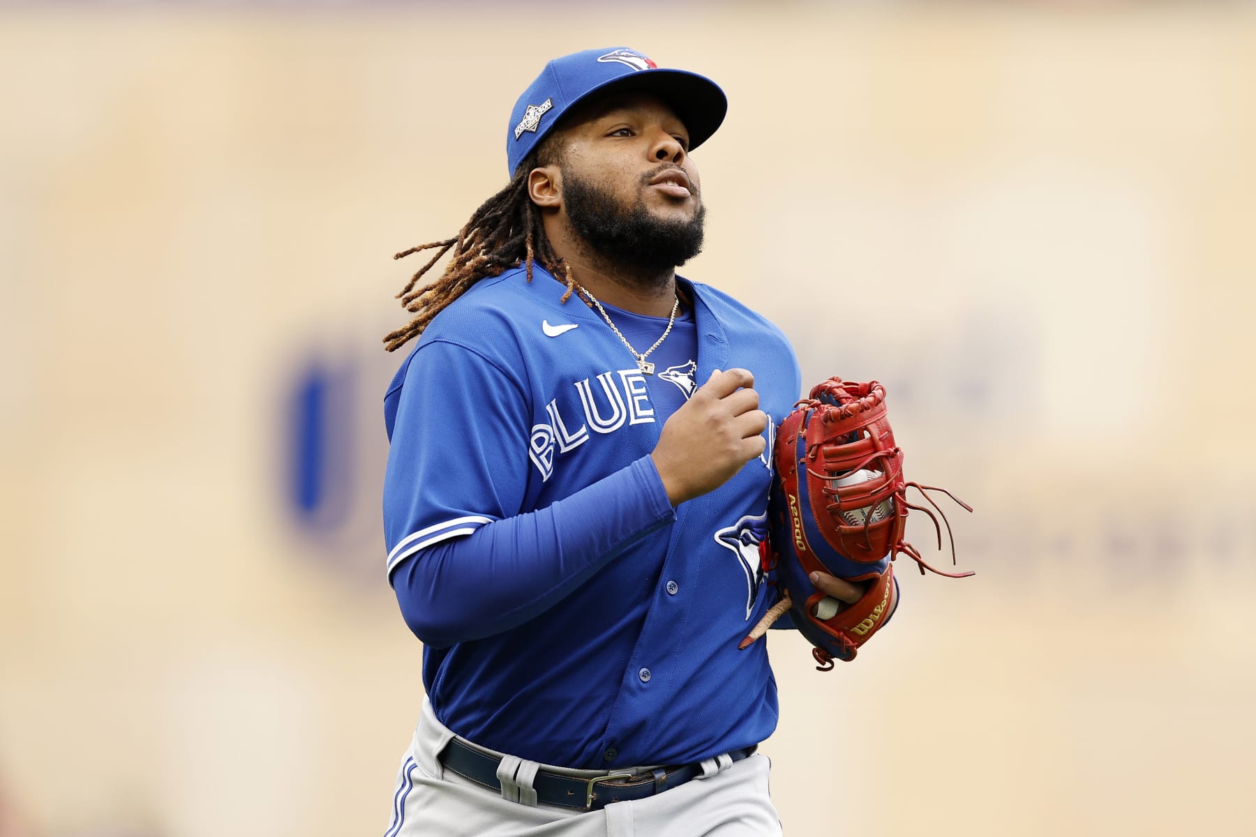 MINNEAPOLIS, MINNESOTA - OCTOBER 04: Vladimir Guerrero Jr. #27 of the Toronto Blue Jays takes the field against the Minnesota Twins during the first inning in Game Two of the Wild Card Series at Target Field on October 04, 2023 in Minneapolis, Minnesota. (Photo by David Berding/Getty Images)