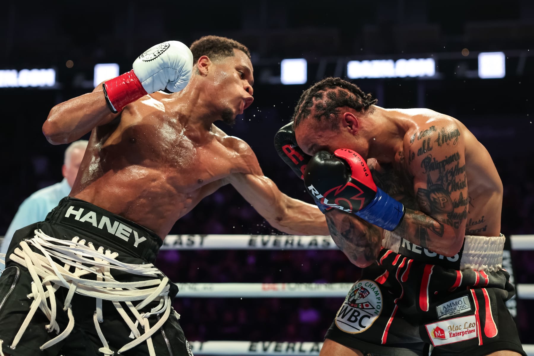 SAN FRANCISCO, CALIFORNIA - DECEMBER 09: Devin Haney punches Regis Prograis during their WBC World Super Lightweight Title fight at Chase Center on December 09, 2023 in San Francisco, California. (Photo by Ezra Shaw/Getty Images)
