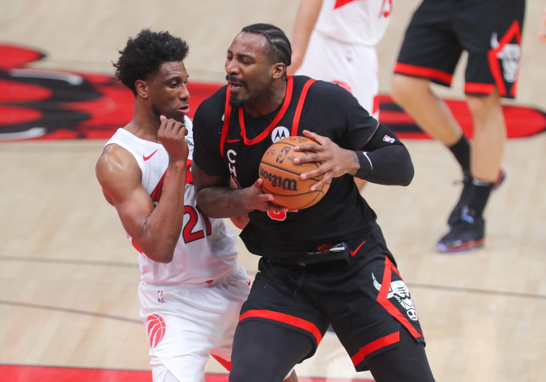 CHICAGO, IL - JANUARY 30: Thaddeus Young #21 of the Toronto Raptors posts up against Andre Drummond #3 of the Chicago Bulls during the first half against at the United Center on January 30, 2024 in Chicago, Illinois. (Photo by Melissa Tamez/Icon Sportswire via Getty Images)