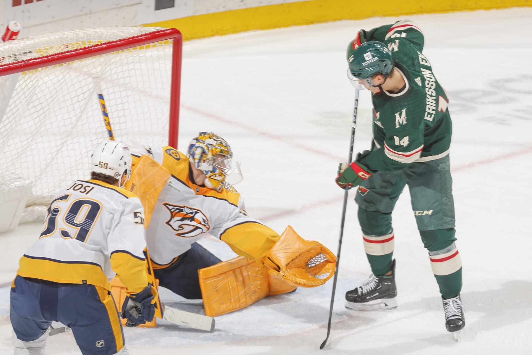 SAINT PAUL, MN - JANUARY 25: Joel Eriksson Ek #14 of the Minnesota Wild scores a goal against Juuse Saros #74 of the Nashville Predators during the game at the Xcel Energy Center on January 25, 2024 in Saint Paul, Minnesota. (Photo by Bruce Kluckhohn/NHLI via Getty Images)