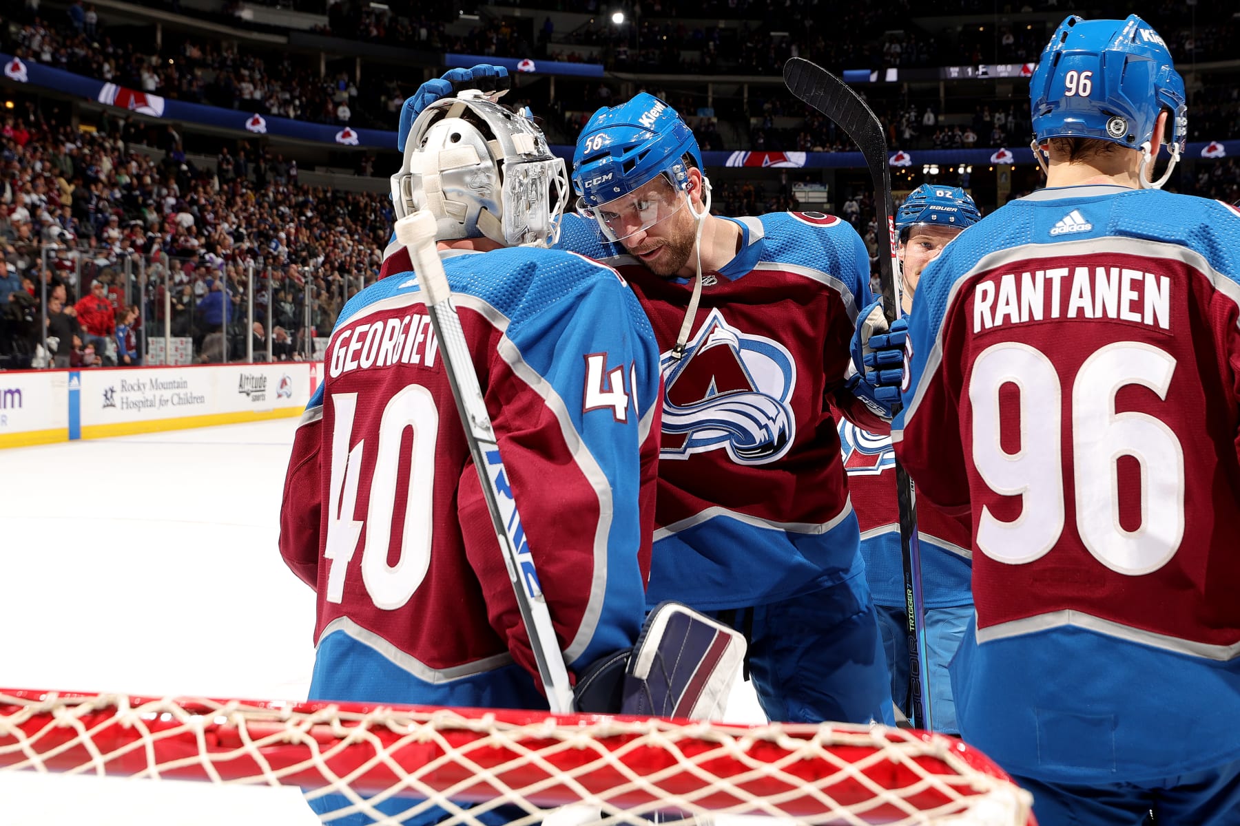 DENVER, COLORADO - JANUARY 26: Goaltender Alexandar Georgiev #40 and Kurtis MacDermid #56 of the Colorado Avalanche celebrate a 5-1 win against the Los Angeles Kings at Ball Arena on January 26, 2024 in Denver, Colorado. (Photo by Michael Martin/NHLI via Getty Images)