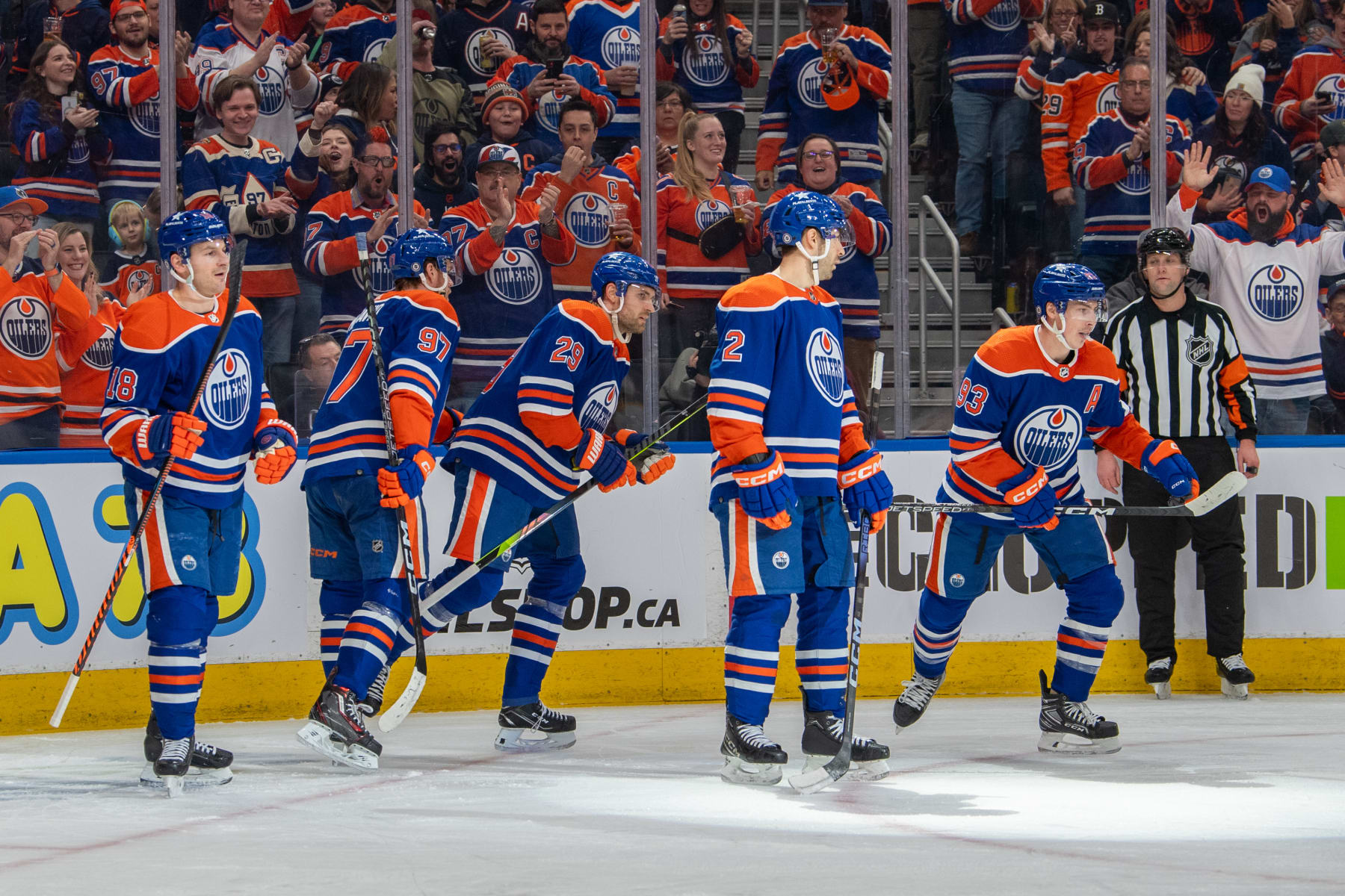 EDMONTON, CANADA - JANUARY 27: Ryan Nugent-Hopkins #93 of the Edmonton Oilers celebrates after his first period goal against the Nashville Predators with teammates Connor McDavid #97, Zach Hyman #18, Evan Bouchard #2 and Leon Draisaitl #29 at Rogers Place on January 27, 2024, in Edmonton, Alberta, Canada. (Photo by Andy Devlin/NHLI via Getty Images)