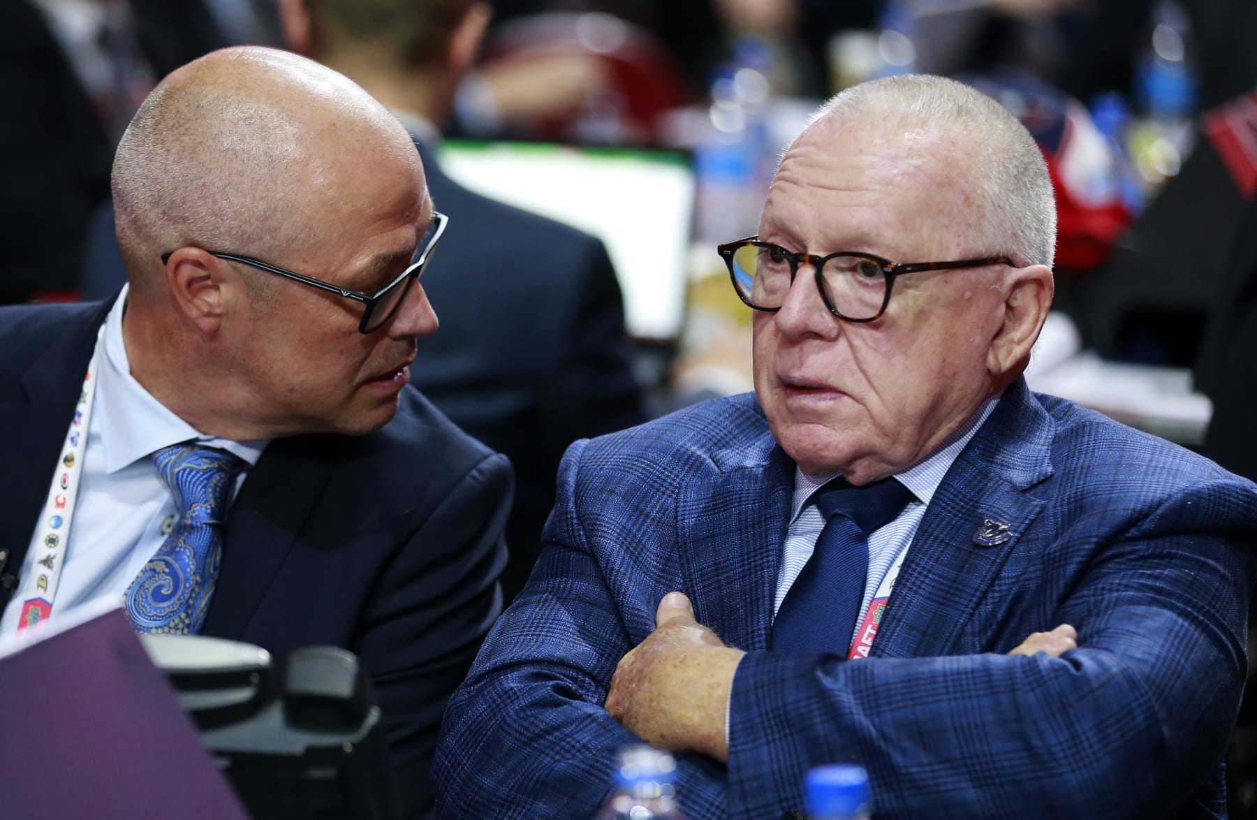 MONTREAL, QUEBEC - JULY 08: (L-R) General manager Patrik Allvin and President of hockey operations Jim Rutherford of the Vancouver Canucks look on during the 2022 Upper Deck NHL Draft at Bell Centre on July 08, 2022 in Montreal, Quebec. (Photo by Jeff Vinnick/NHLI via Getty Images)