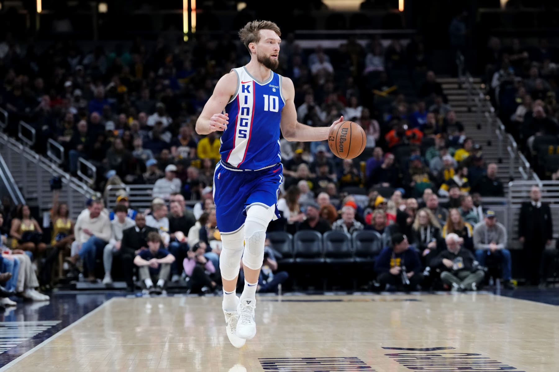 INDIANAPOLIS, INDIANA - FEBRUARY 02: Domantas Sabonis #10 of the Sacramento Kings dribbles the ball in the first quarter against the Indiana Pacers at Gainbridge Fieldhouse on February 02, 2024 in Indianapolis, Indiana. NOTE TO USER: User expressly acknowledges and agrees that, by downloading and or using this photograph, User is consenting to the terms and conditions of the Getty Images License Agreement. (Photo by Dylan Buell/Getty Images)