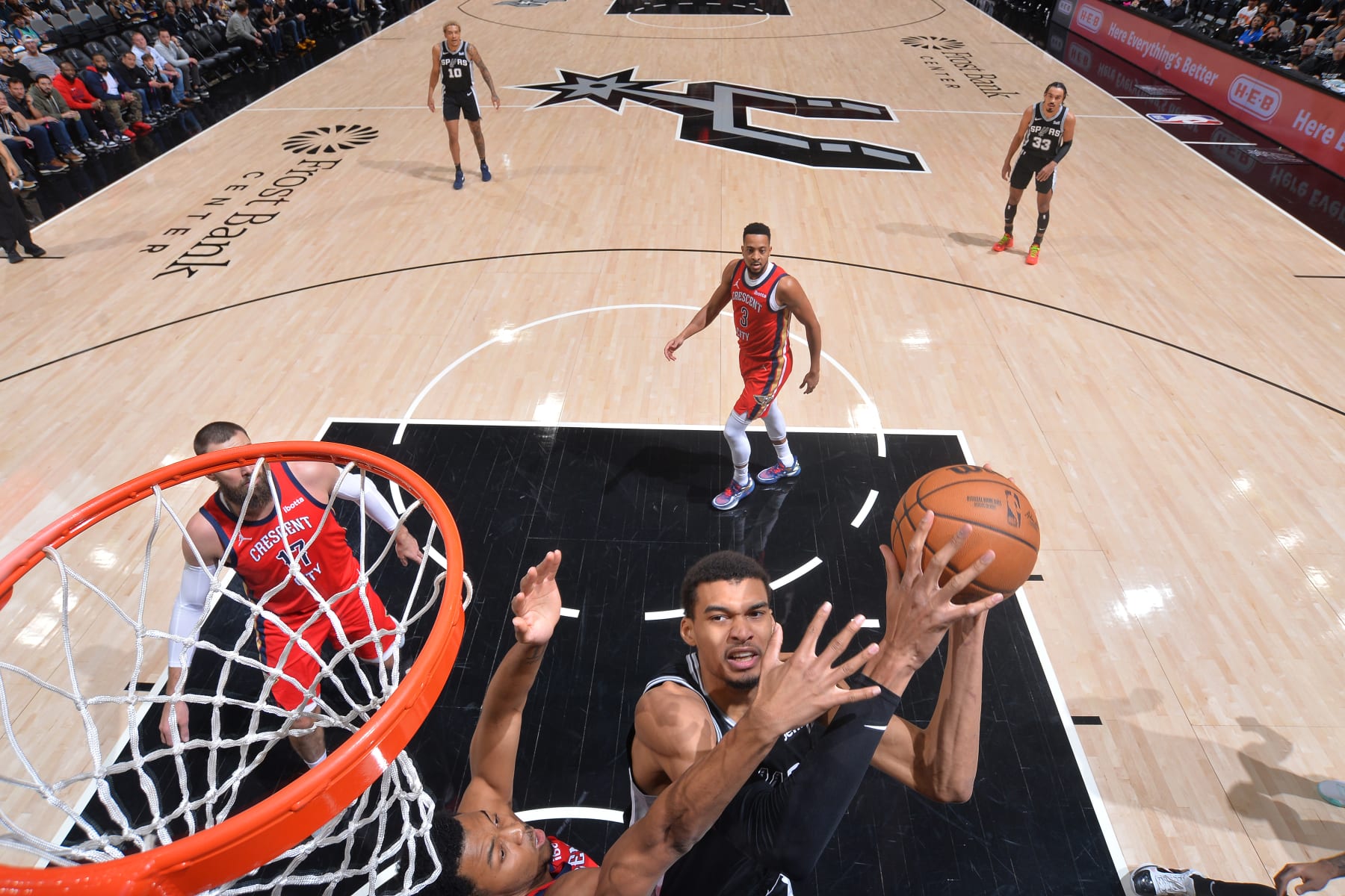 SAN ANTONIO, TX - FEBRUARY 2:  Victor Wembanyama #1 of the San Antonio Spurs drives to the basket during the game against the New Orleans Pelicans on February 2, 2024 at the Frost Bank Center in San Antonio, Texas. NOTE TO USER: User expressly acknowledges and agrees that, by downloading and or using this photograph, user is consenting to the terms and conditions of the Getty Images License Agreement. Mandatory Copyright Notice: Copyright 2024 NBAE (Photos by Michael Gonzales/NBAE via Getty Images)