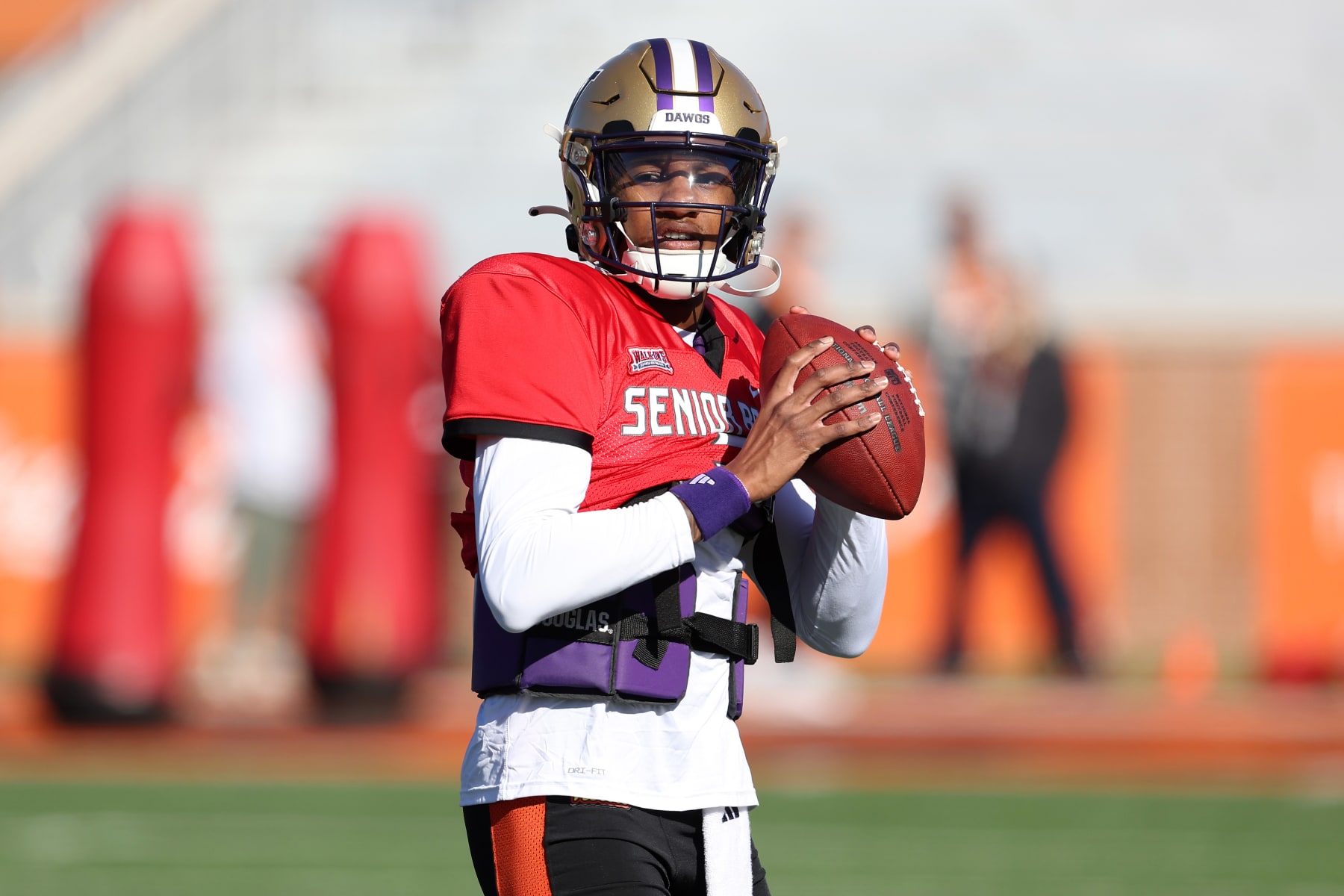 MOBILE, AL - JANUARY 31: National quarterback Michael Penix Jr. of Washington (9) during the National team practice for the Reese's Senior Bowl on January 31, 2024 at Hancock Whitney Stadium in Mobile, Alabama.  (Photo by Michael Wade/Icon Sportswire via Getty Images)