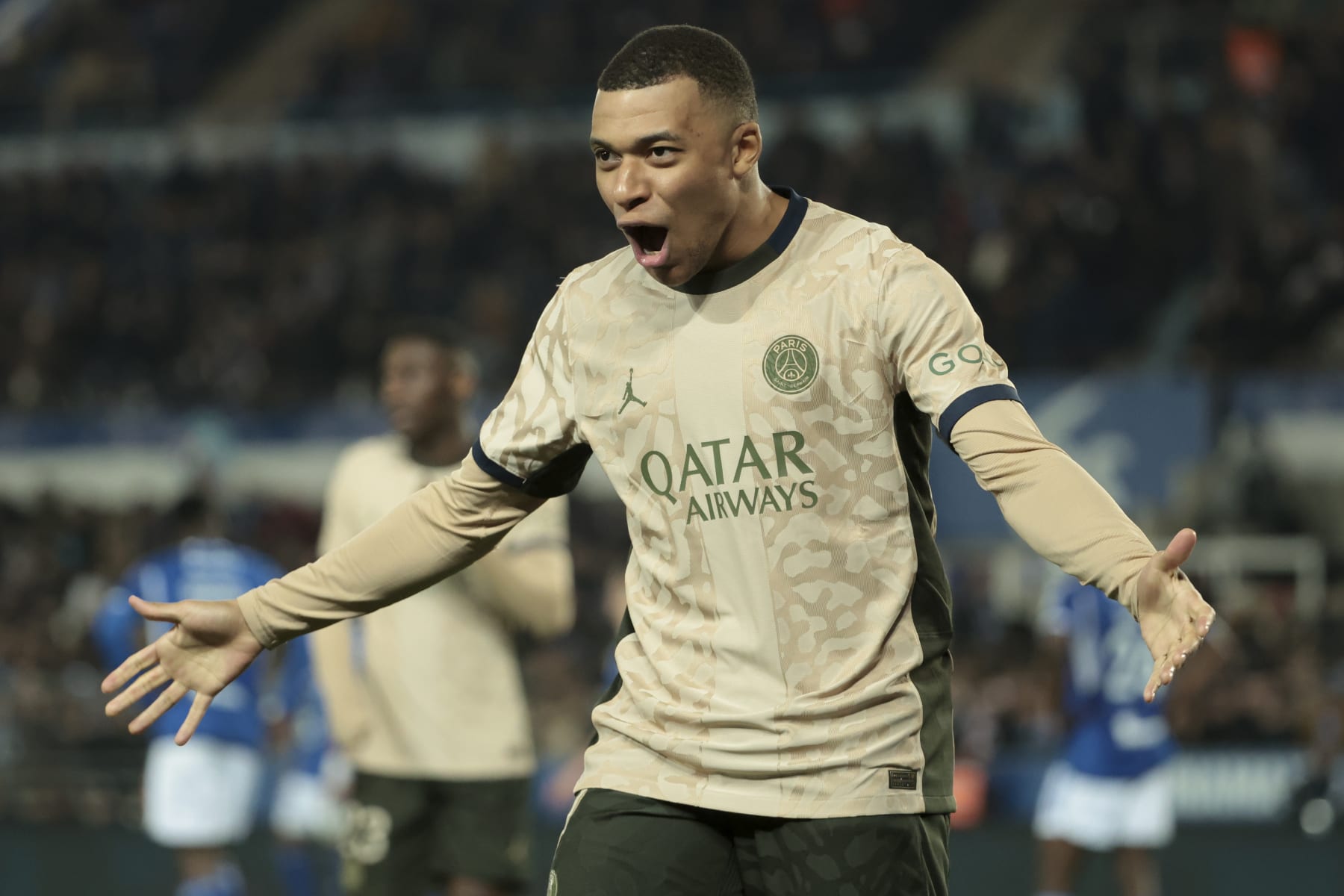STRASBOURG, FRANCE - FEBRUARY 2: Kylian Mbappe of PSG celebrates the goal of Marco Asensio during the Ligue 1 Uber Eats match between RC Strasbourg Alsace (RCSA) and Paris Saint-Germain (PSG) at Stade de la Meinau on February 2, 2024 in Strasbourg, France. (Photo by Jean Catuffe/Getty Images)