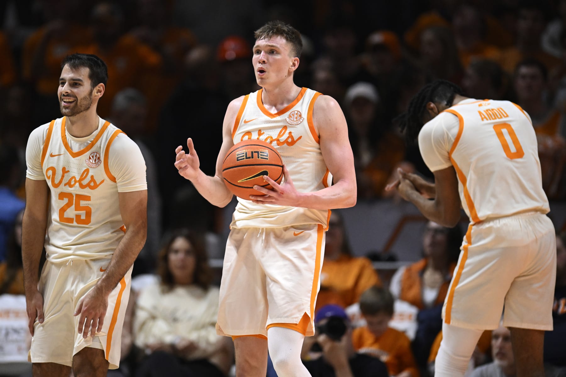 KNOXVILLE, TENNESSEE - JANUARY 30: Santiago Vescovi #25, Dalton Knecht #3, and Jonas Aidoo #0 of the Tennessee Volunteers react after a foul is called on Knecht against the South Carolina Gamecocks in the second half at Thompson-Boling Arena on January 30, 2024 in Knoxville, Tennessee. (Photo by Eakin Howard/Getty Images)