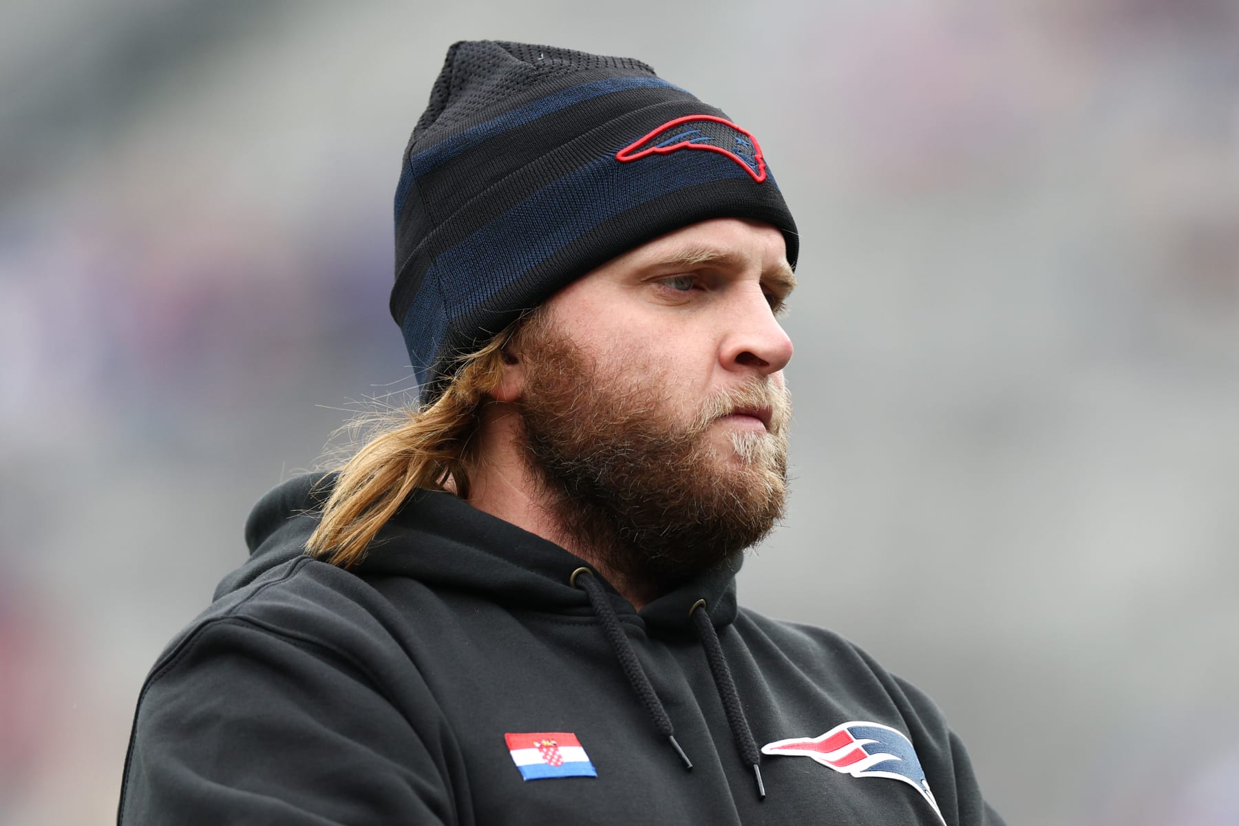 EAST RUTHERFORD, NEW JERSEY - NOVEMBER 26: New England Patriots outside linebackers coach Stephen Belichick looks on prior to a game against the New York Giants at MetLife Stadium on November 26, 2023 in East Rutherford, New Jersey. (Photo by Elsa/Getty Images)