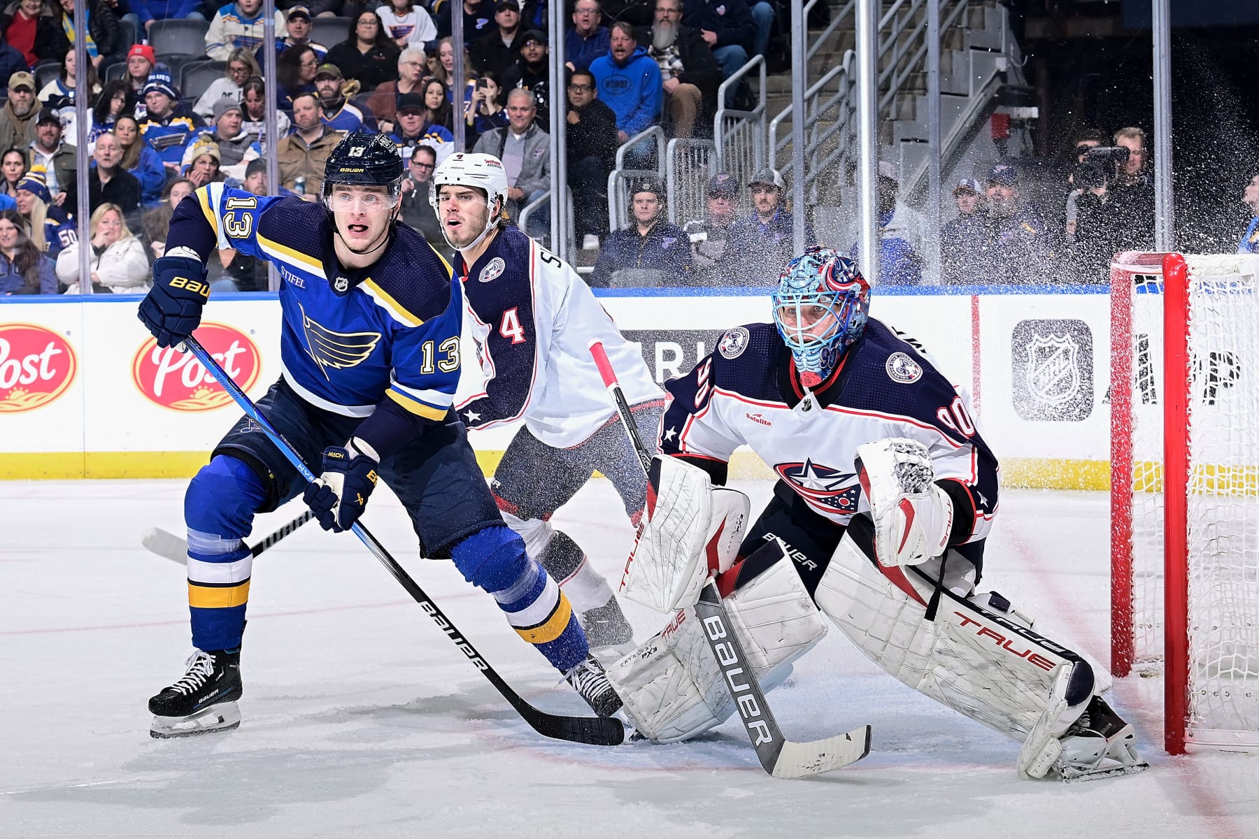 ST. LOUIS, MO - JANUARY 30: Elvis Merzlikins #90 of the Columbus Blue Jackets defends the net against Alexey Toropchenko #13 of the St. Louis Blues in the second period on January 30, 2024 at the Enterprise Center in St. Louis, Missouri. (Photo by Scott Rovak/NHLI via Getty Images)