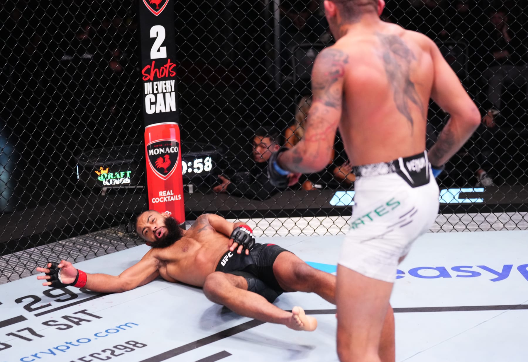 LAS VEGAS, NEVADA - FEBRUARY 10: (R-L) Carlos Prates of Brazil knocks out Trevin Giles in a welterweight fight during the UFC Fight Night event at UFC APEX on February 10, 2024 in Las Vegas, Nevada. (Photo by Jeff Bottari/Zuffa LLC via Getty Images)