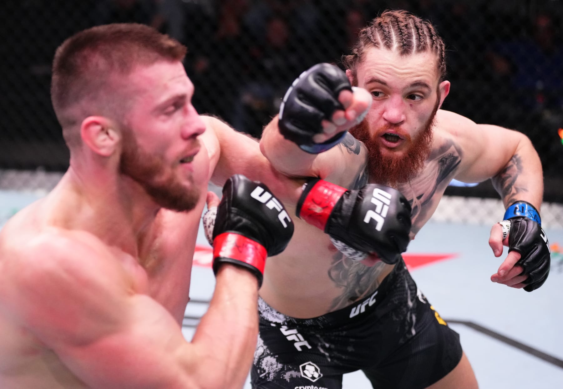 LAS VEGAS, NEVADA - FEBRUARY 10: (R-L) Ihor Potieria of Ukraine punches Robert Bryczek of Poland in a middleweight fight during the UFC Fight Night event at UFC APEX on February 10, 2024 in Las Vegas, Nevada. (Photo by Jeff Bottari/Zuffa LLC via Getty Images)