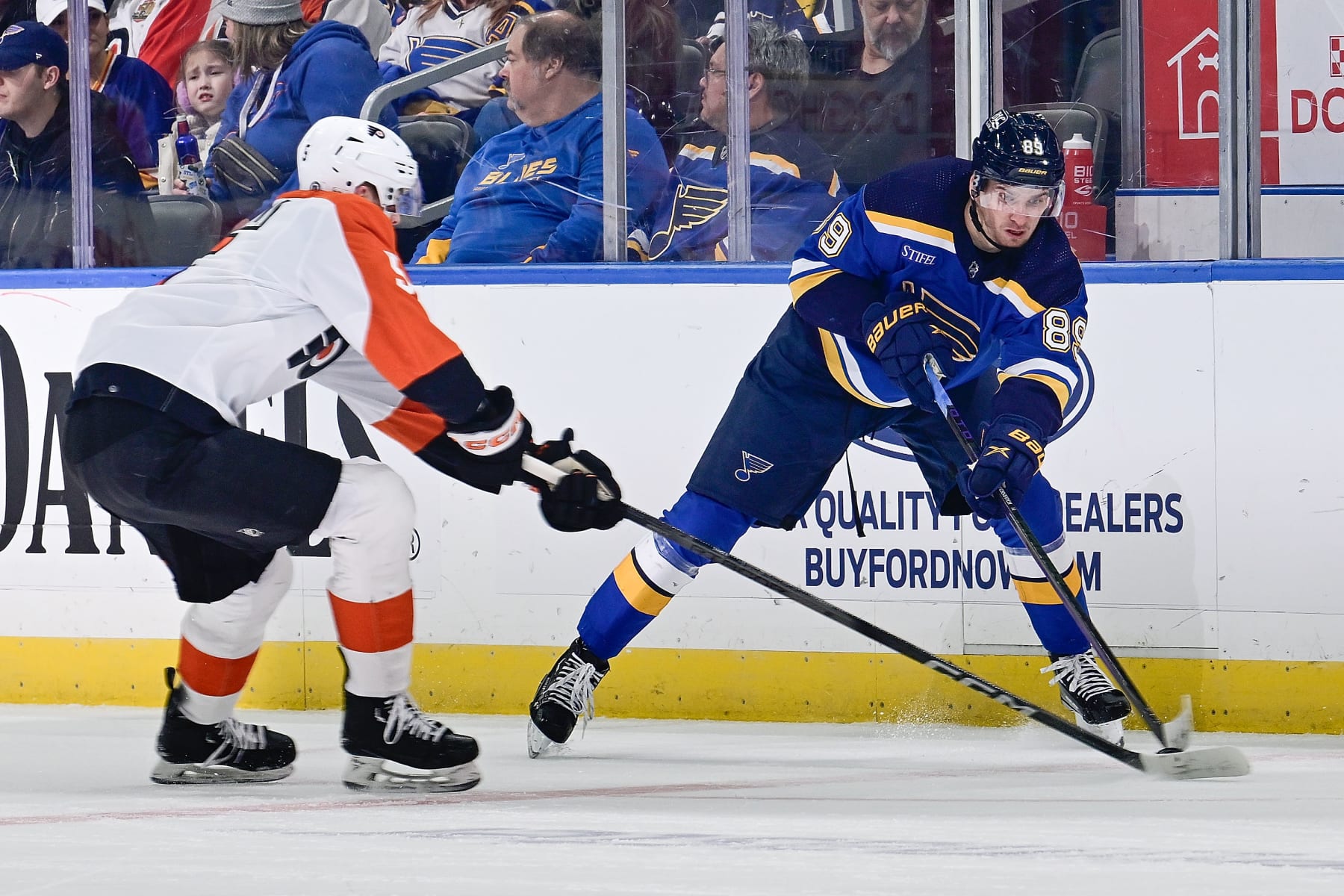 ST. LOUIS, MO - JANUARY 15: Pavel Buchnevich #89 of the St. Louis Blues attempts a pass against the Philadelphia Flyers on January 15, 2024 at the Enterprise Center in St. Louis, Missouri. (Photo by Scott Rovak/NHLI via Getty Images)