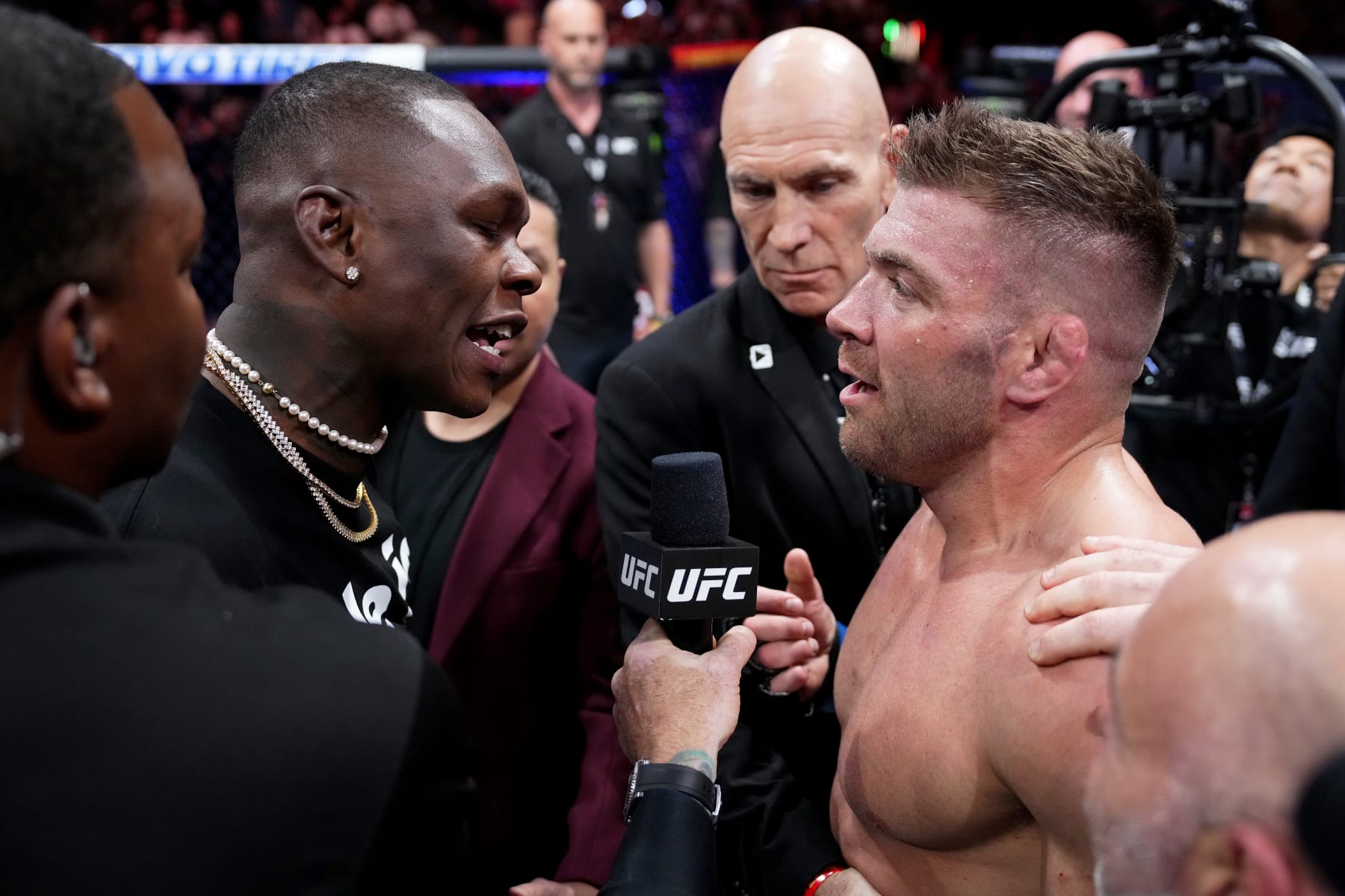 Israel Adesanya (left) faces off against Dricus Du Plessis at UFC 290 in July, 2023.