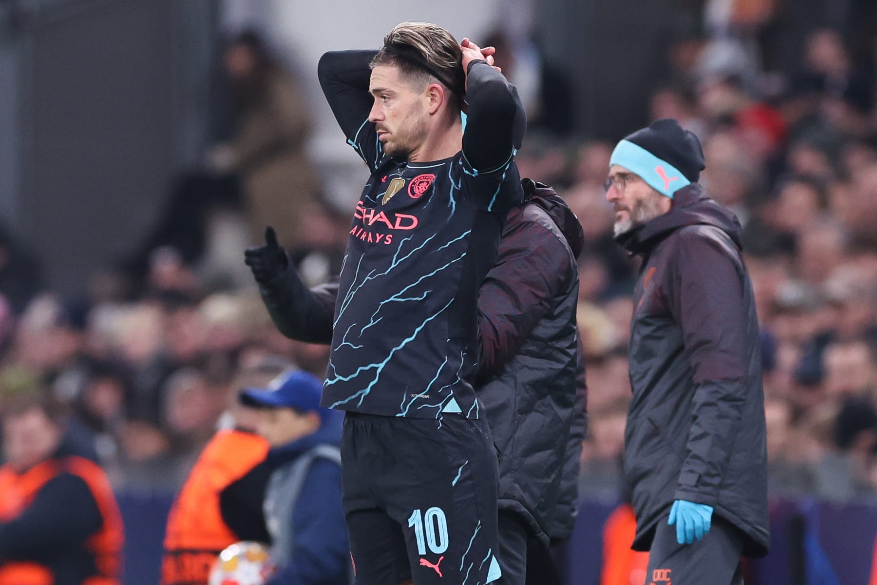 COPENHAGEN, DENMARK - FEBRUARY 13: Jack Grealish of Manchester City reacts with an injury during the UEFA Champions League 2023/24 round of 16 first leg match between F.C. Copenhagen and Manchester City at Parken Stadium on February 13, 2024 in Copenhagen, Denmark. (Photo by Alex Livesey - Danehouse/Getty Images)