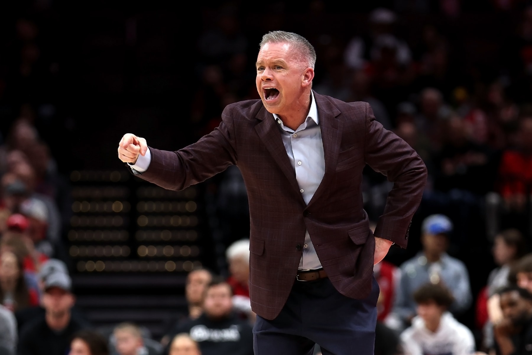 COLUMBUS, OHIO - FEBRUARY 10: Head coach Chris Holtmann of the Ohio State Buckeyes yells to his players during the game against the Maryland Terrapins at Value City Arena on February 10, 2024 in Columbus, Ohio. Ohio State defeated Maryland 79-75 in double overtime. (Photo by Kirk Irwin/Getty Images)