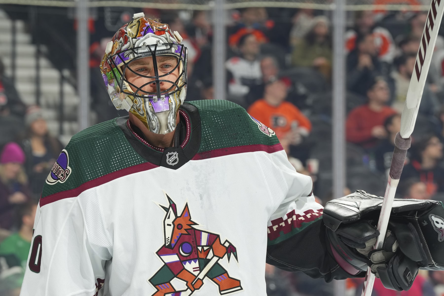 PHILADELPHIA, PENNSYLVANIA - FEBRUARY 12: Karel Vejmelka #70 of the Arizona Coyotes looks on against the Philadelphia Flyers at the Wells Fargo Center on February 12, 2024 in Philadelphia, Pennsylvania. The Flyers defeated the Coyotes 5-3. (Photo by Mitchell Leff/Getty Images)