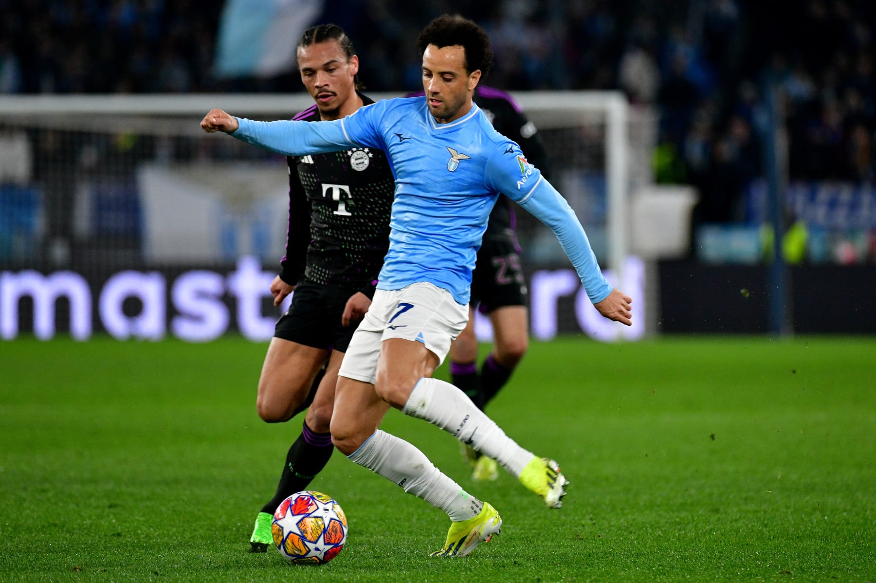 ROME, ITALY - FEBRUARY 13: Felipe Anderson of SS Lazio compete for the ball with Leroy Sanè of Bayern Munchen during the UEFA Champions League match against SS Lazio and Bayern Munchen at Formello sport centre on February 13, 2024 in Rome, Italy. (Photo by Marco Rosi - SS Lazio/Getty Images)